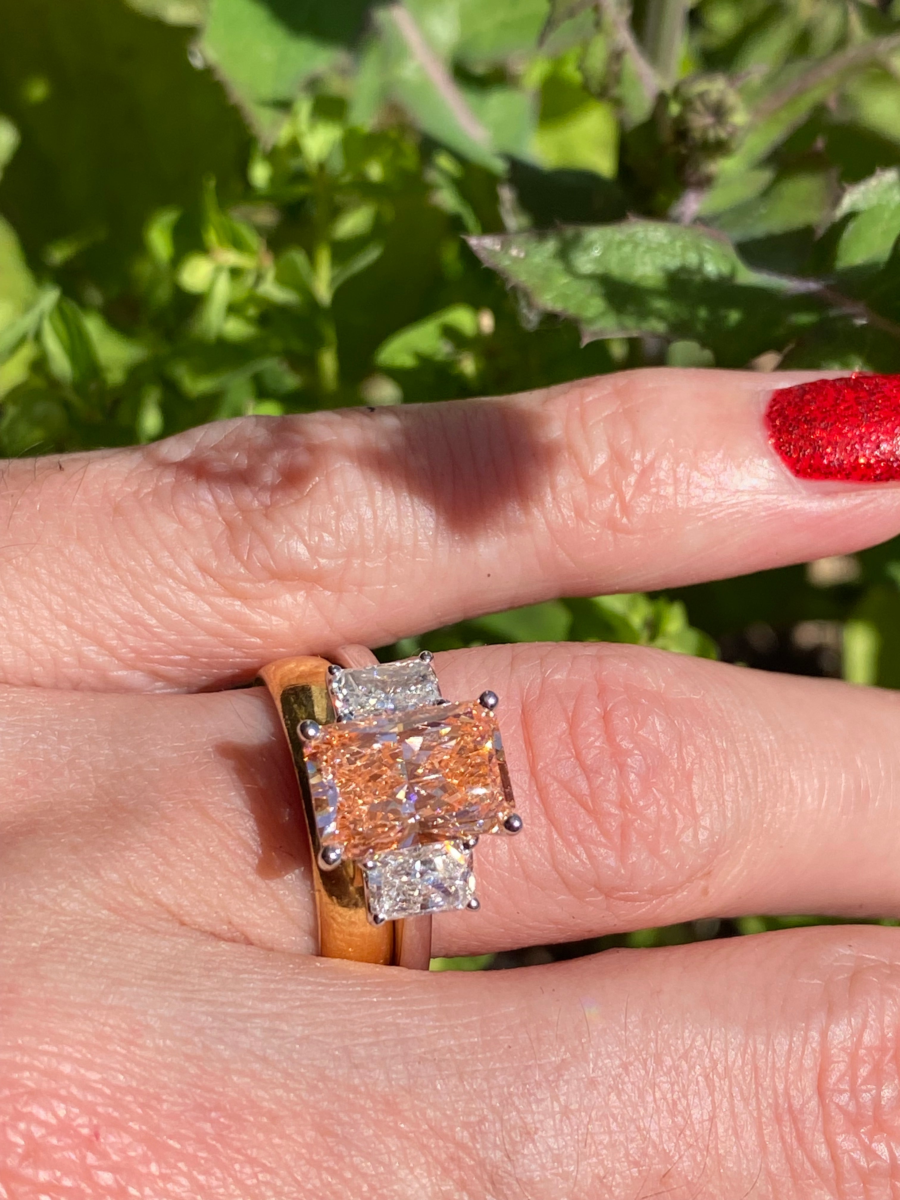 4.12 CTW Fancy Radiant Cut Pink Lab Grown Diamond Graduated Three Stone Ring in Platinum