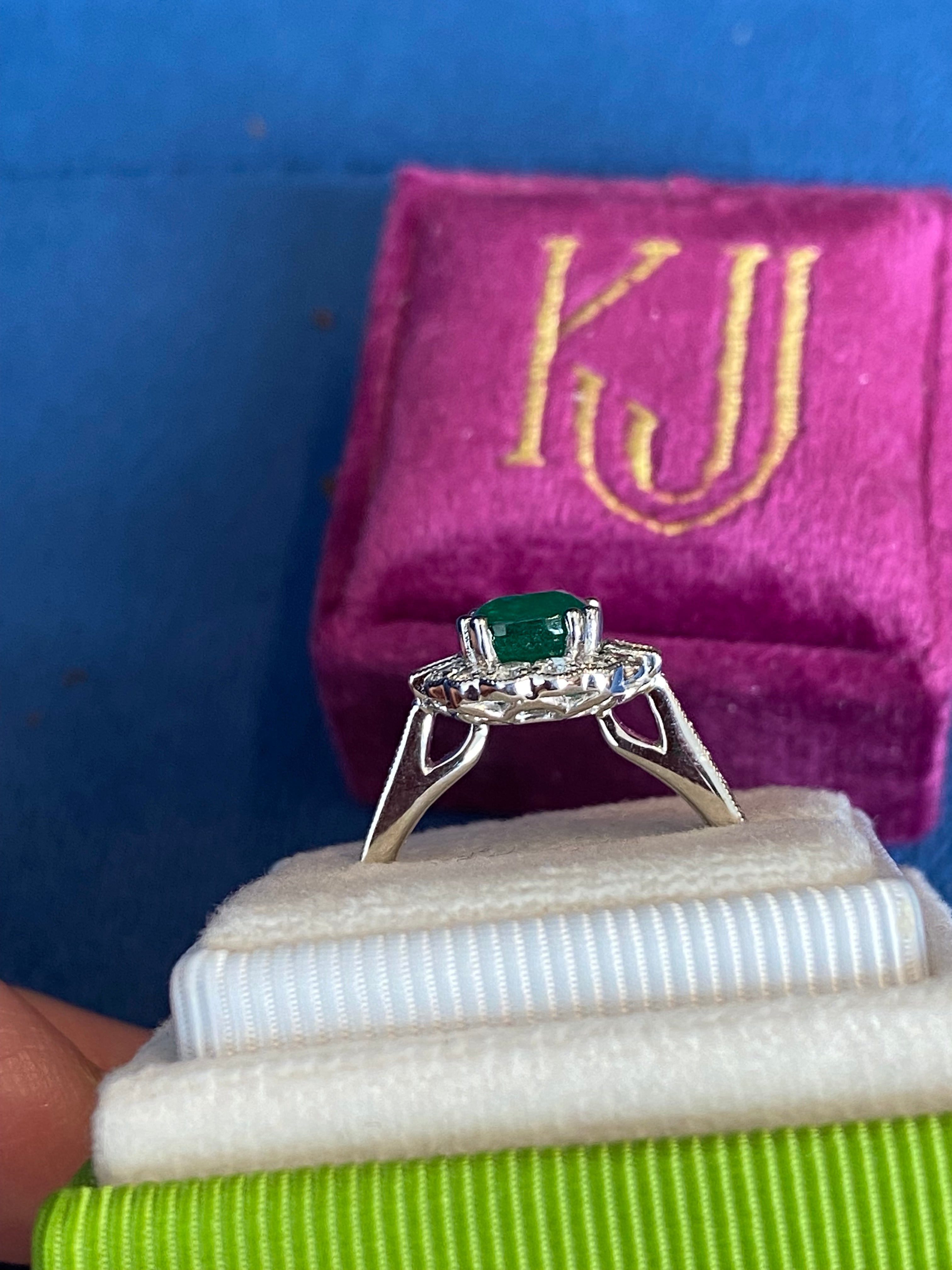 2.02 Carat Cushion Cut Emerald and 0.65 CTW Natural Diamond Halo Ring in Platinum