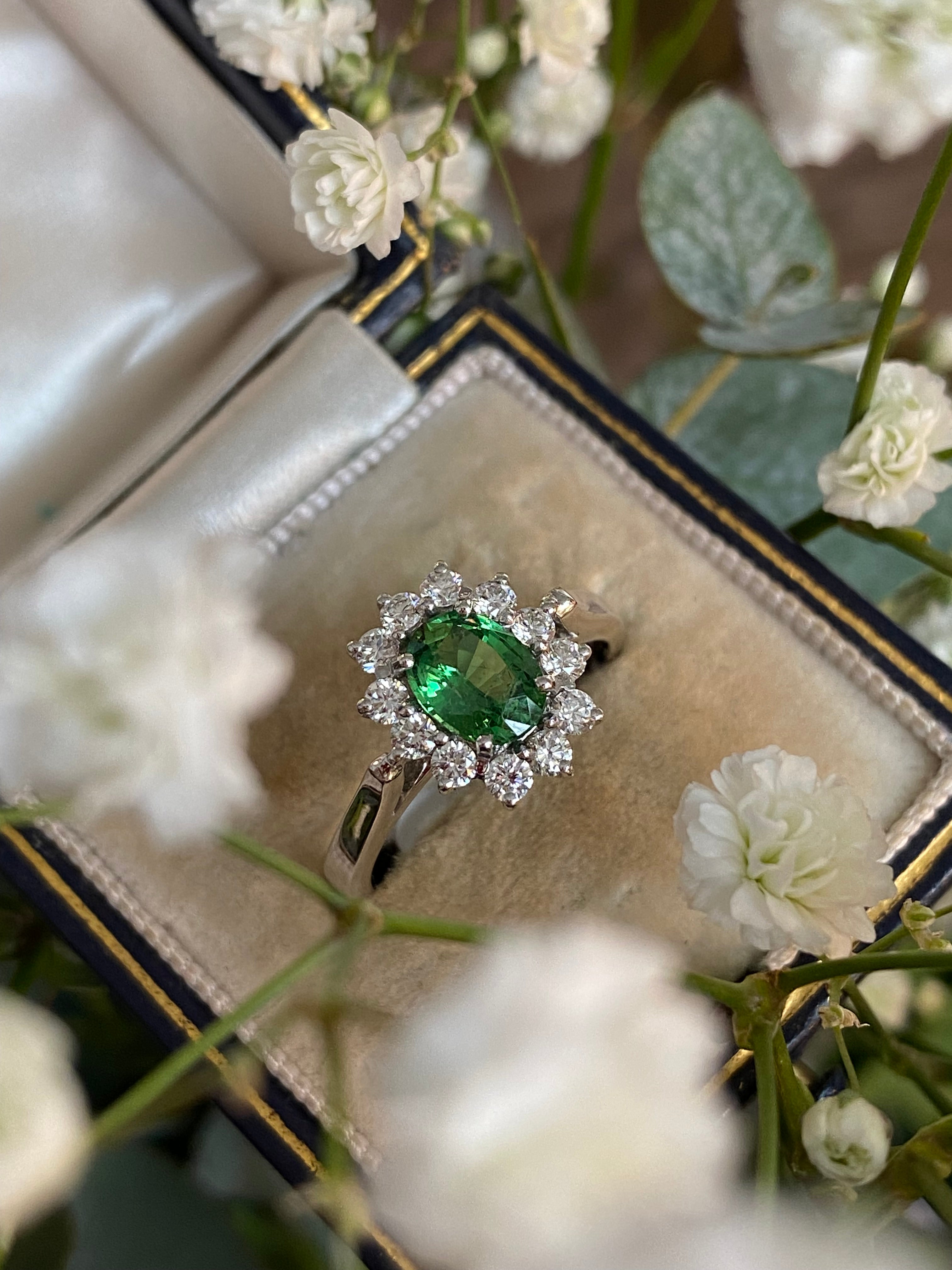 1.50 CTW Tsavorite Garnet and Diamond Halo Engagement Ring in 18ct White Gold