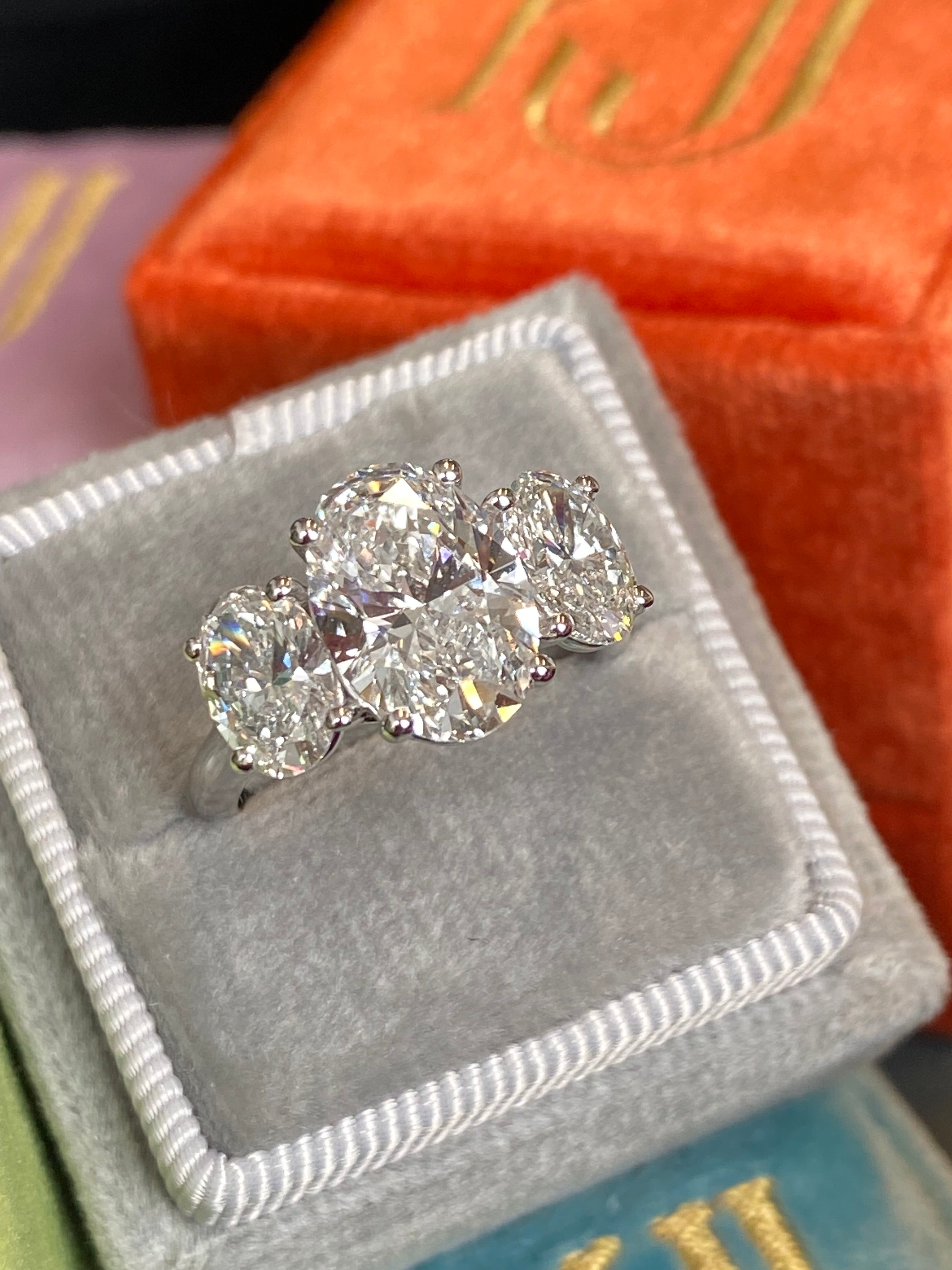 4.95 CTW Oval Cut D Colour VS2 Lab Diamond Three Stone Ring in Platinum