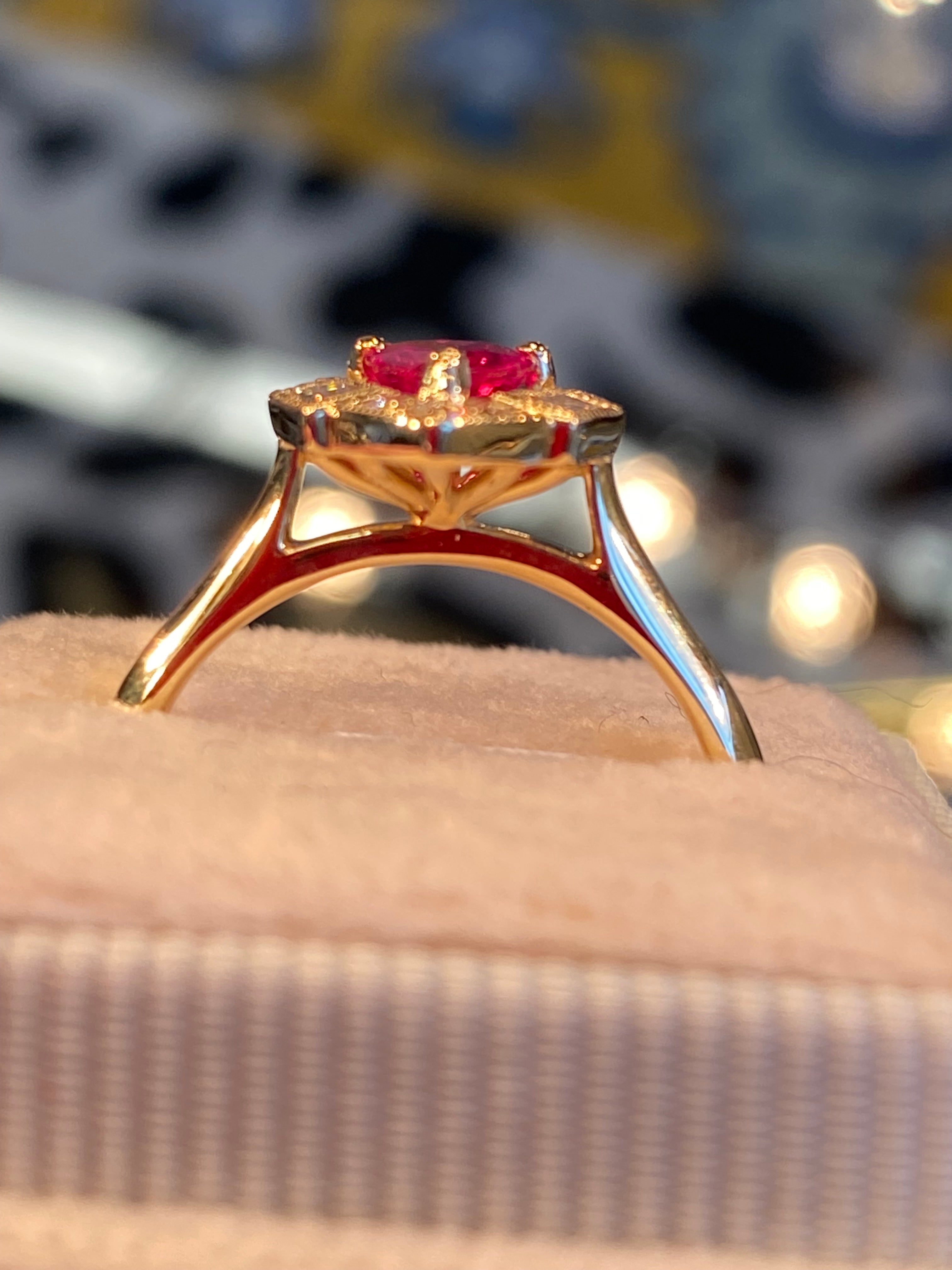 0.85 CTW Pear Cut Ruby and Natural Diamond Halo Ring in 18ct Yellow Gold