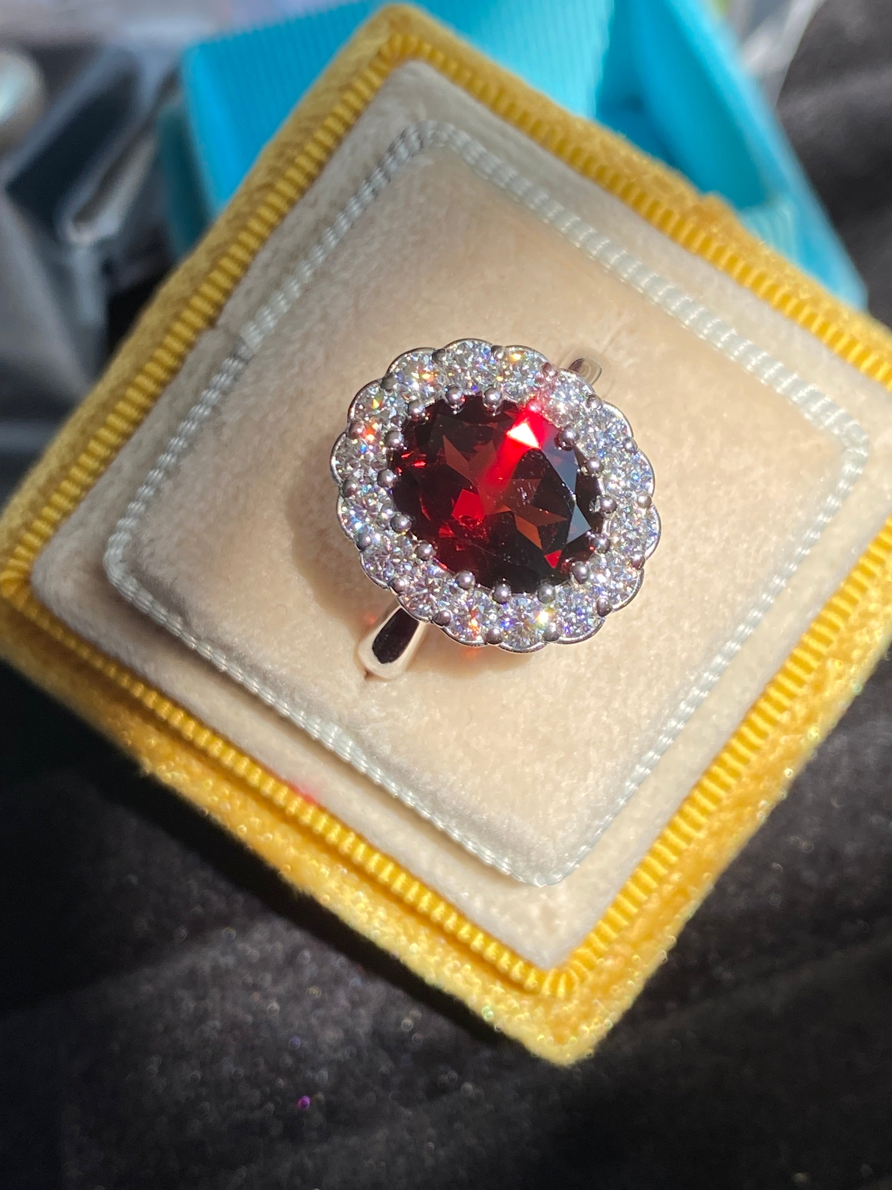 5.50 CTW Oval Cut Garnet and Moissanite Halo Cocktail Ring