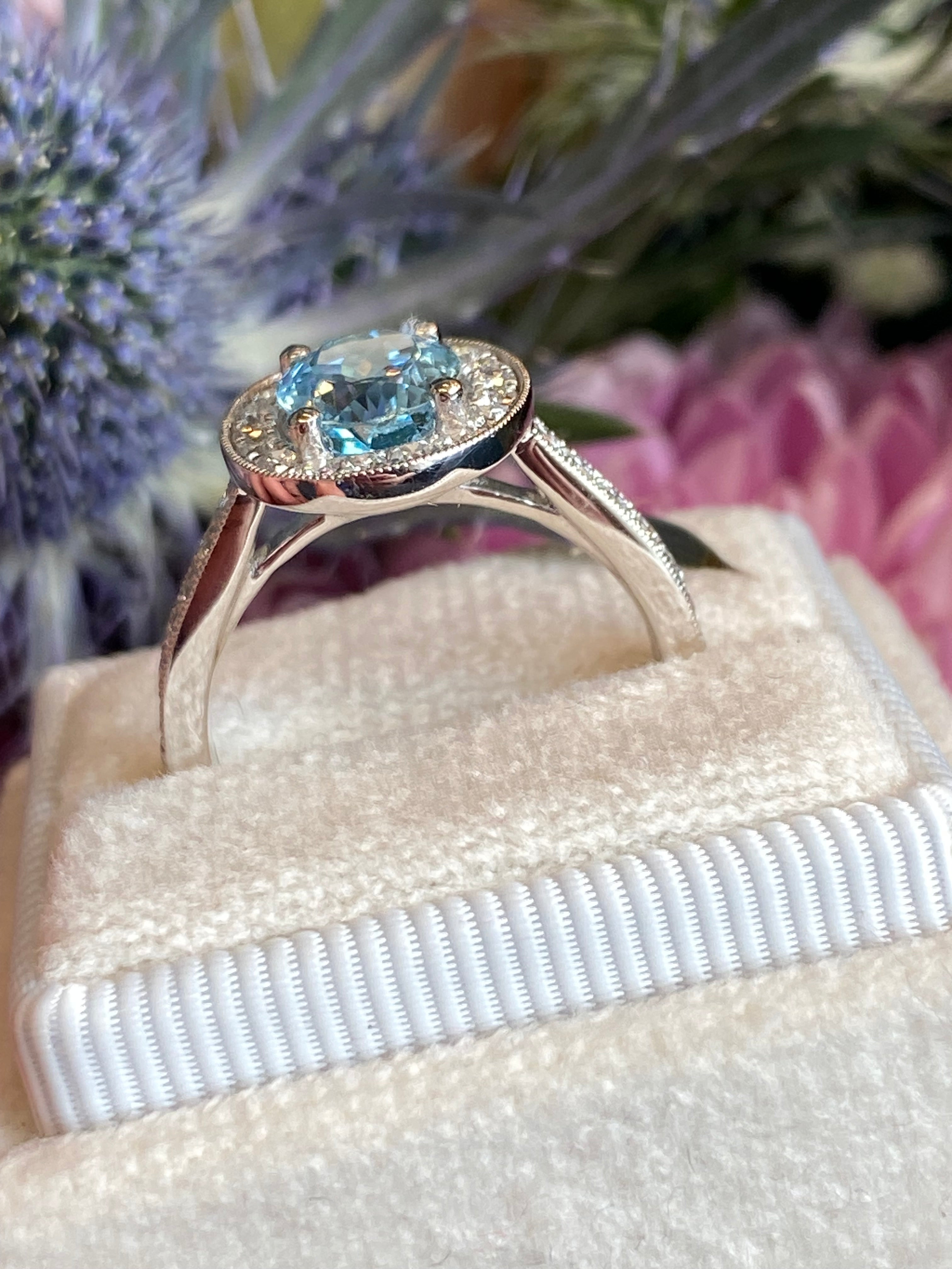2.33 CTW Oval Cut Aquamarine and Natural Diamond Halo Engagement Ring in 18ct White Gold