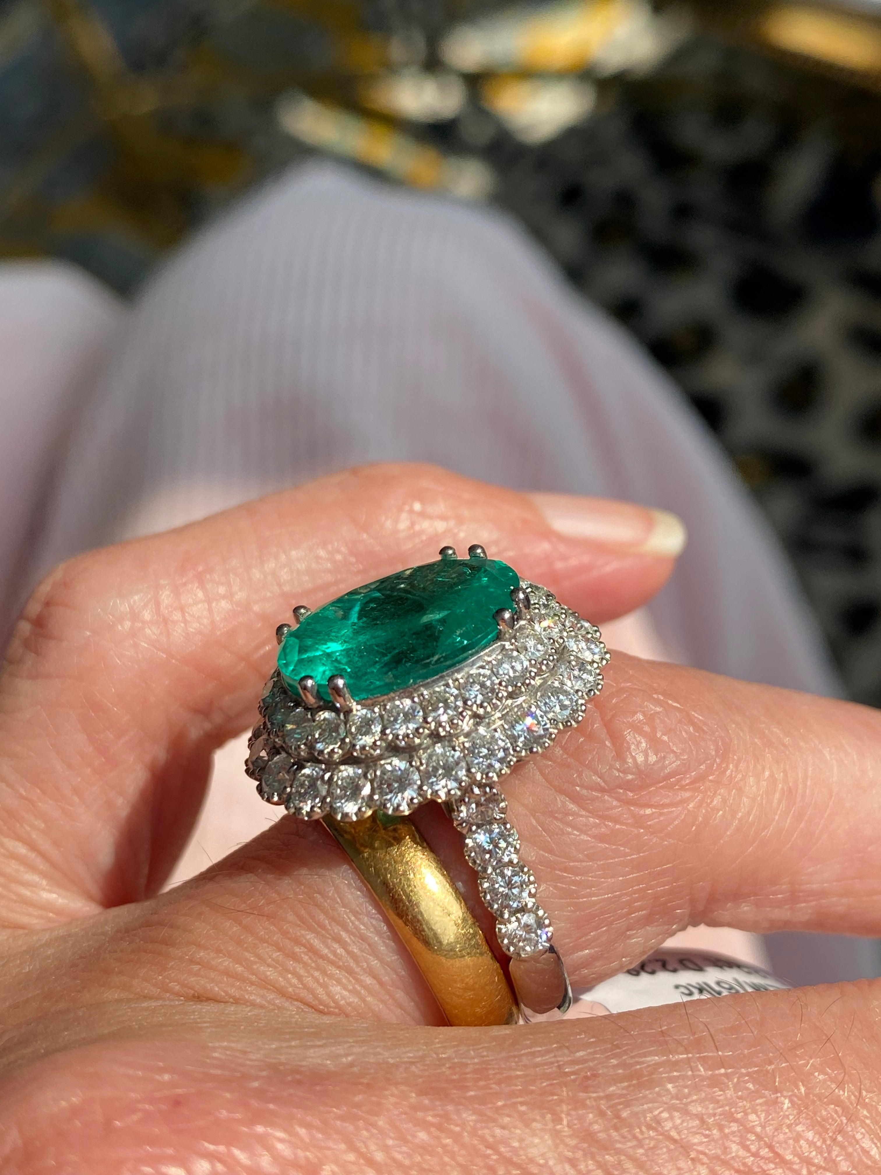 9.10 CTW Colombian Emerald and Natural Diamond Double Halo Ring in Platinum