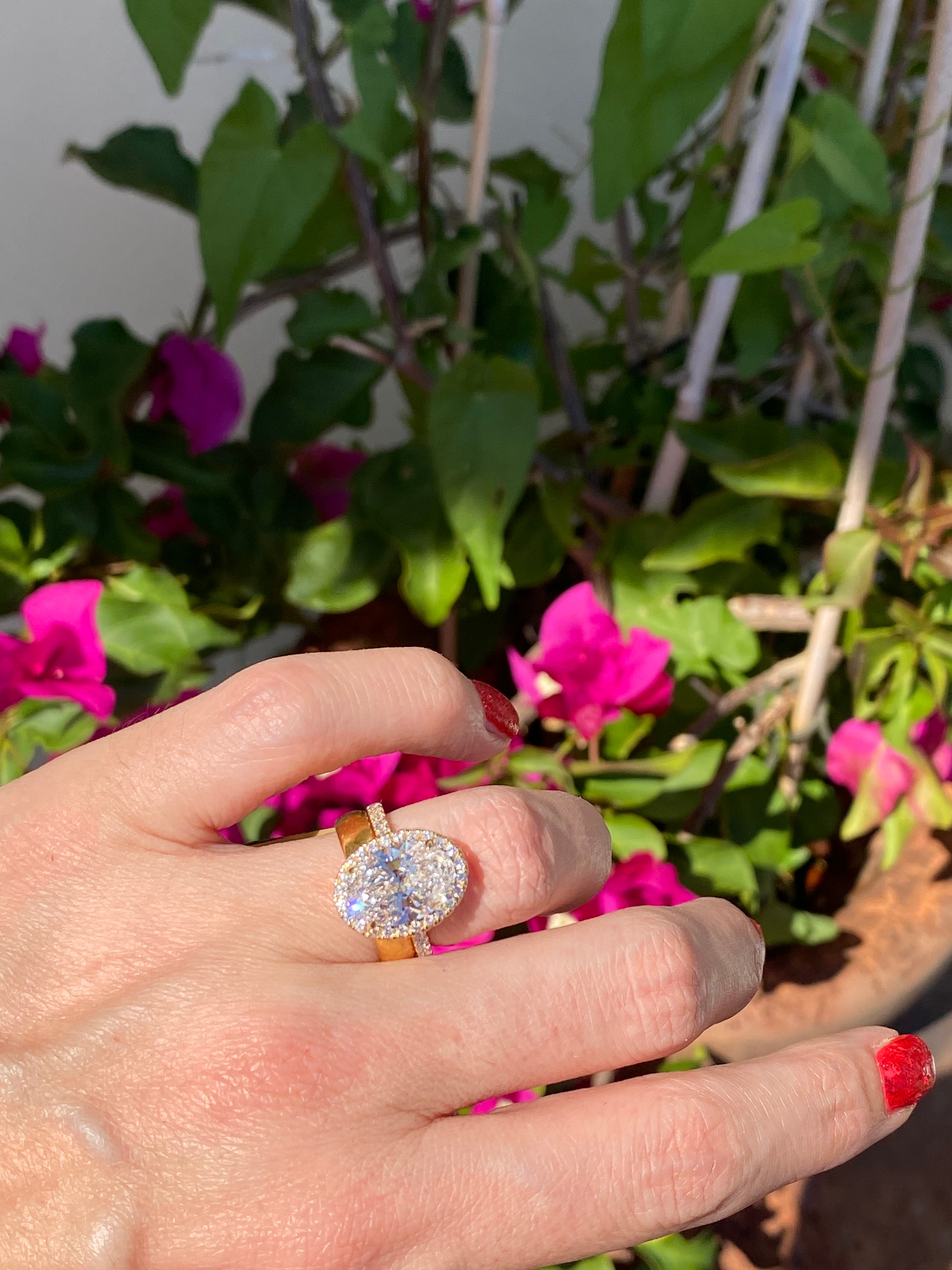 4.59 CTW Oval Cut Lab Diamond Halo Engagement Ring in 18ct Yellow Gold