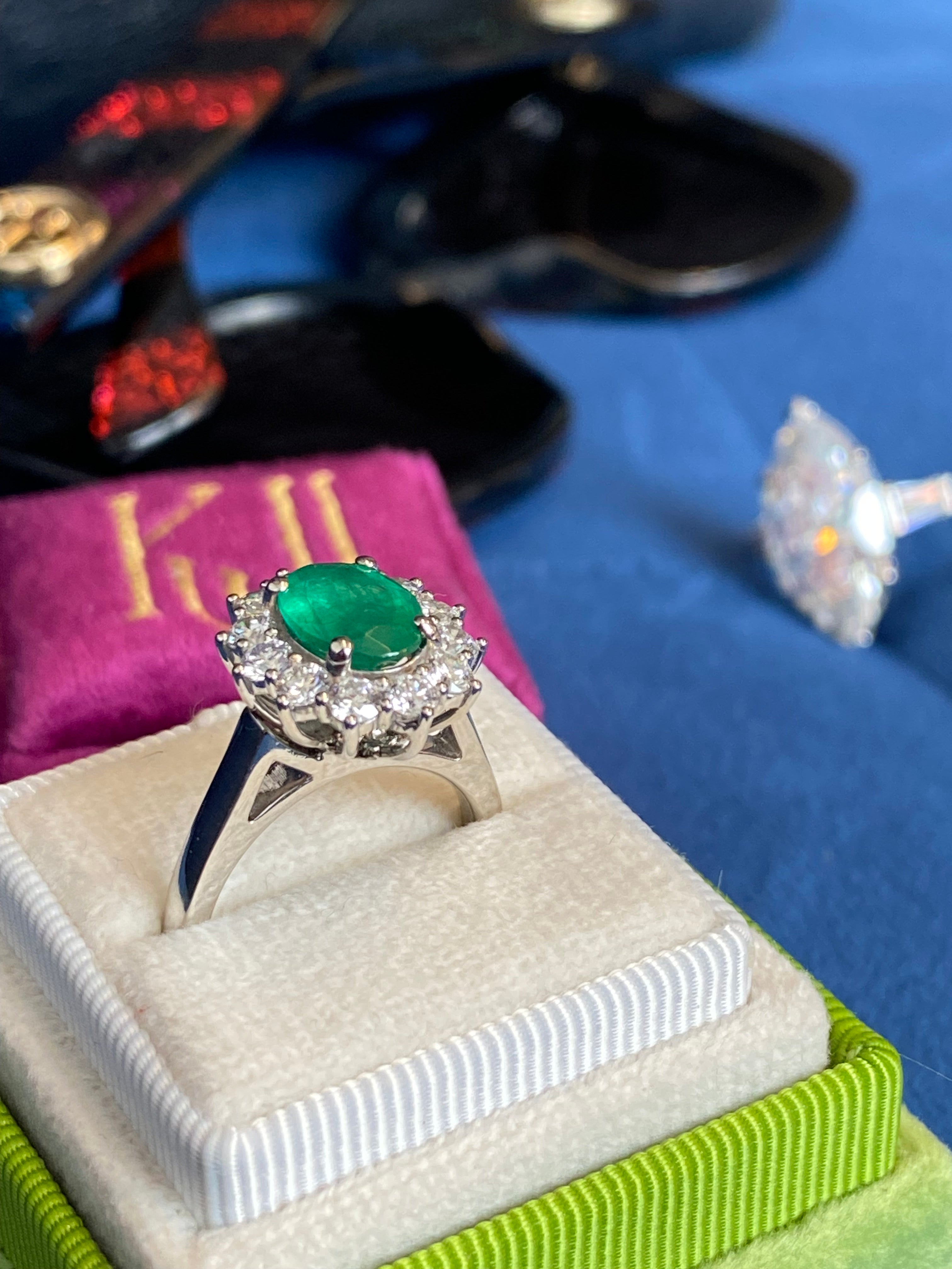 1.53 Carat Cushion Cut Emerald and 0.96 CTW Natural Diamond Halo Ring in Platinum
