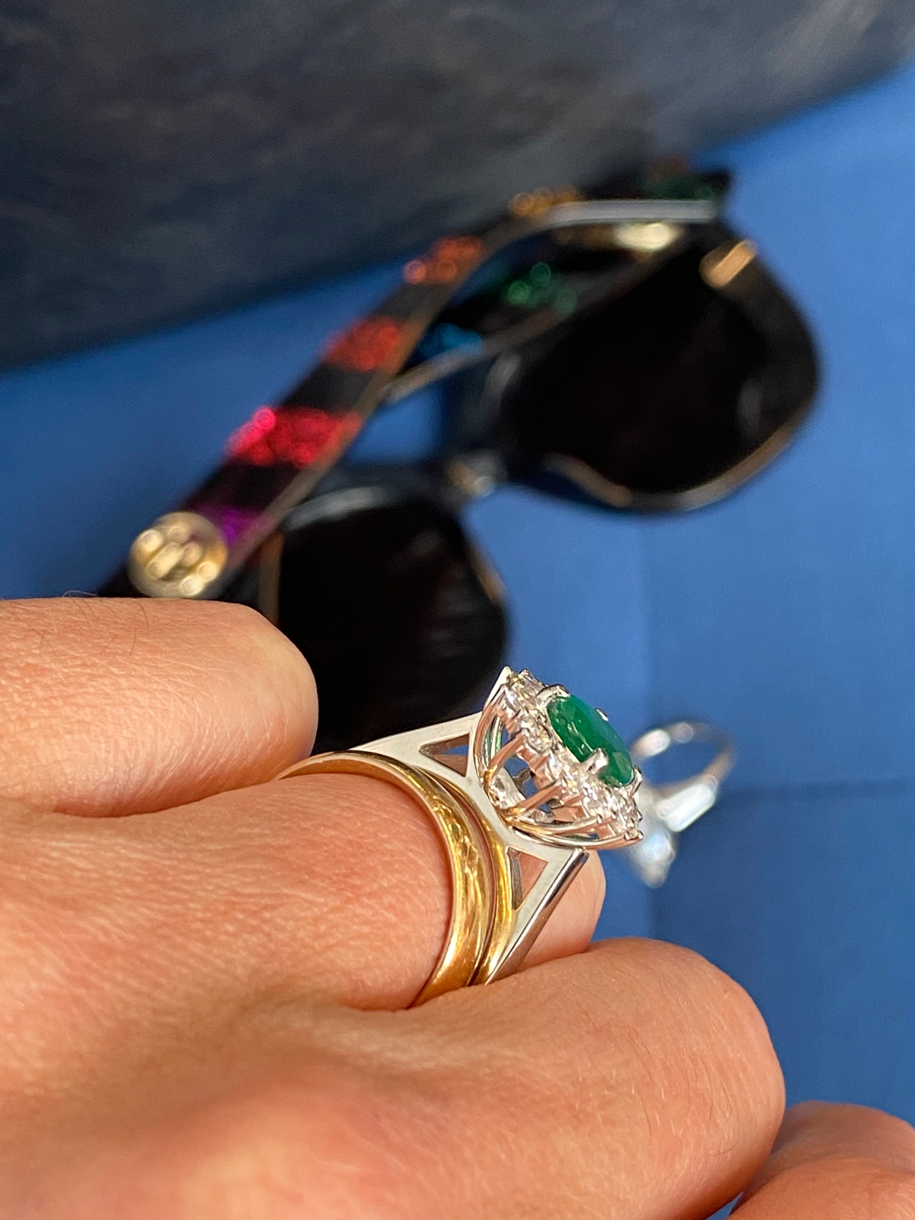 1.53 Carat Cushion Cut Emerald and 0.96 CTW Natural Diamond Halo Ring in Platinum
