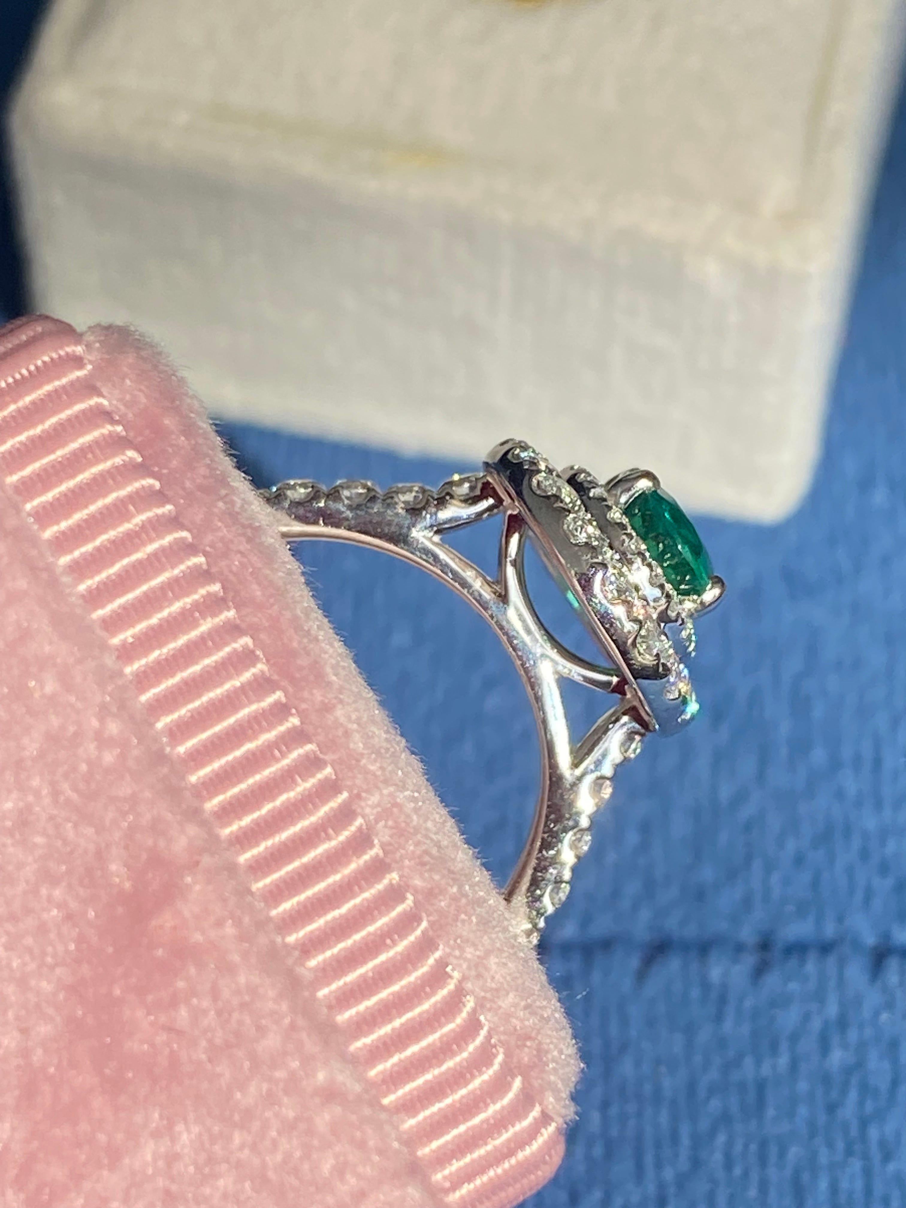 2.11 CTW Oval Cut Emerald and Natural Diamond Double Halo Ring in Platinum