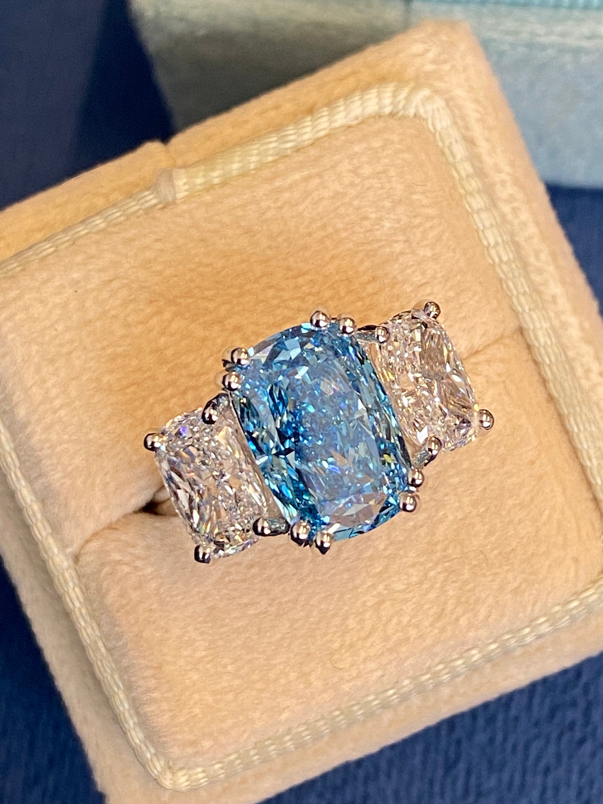 6.60 CTW Fancy Blue Cushion Cut Lab Diamond Graduated Three Stone Ring in Platinum