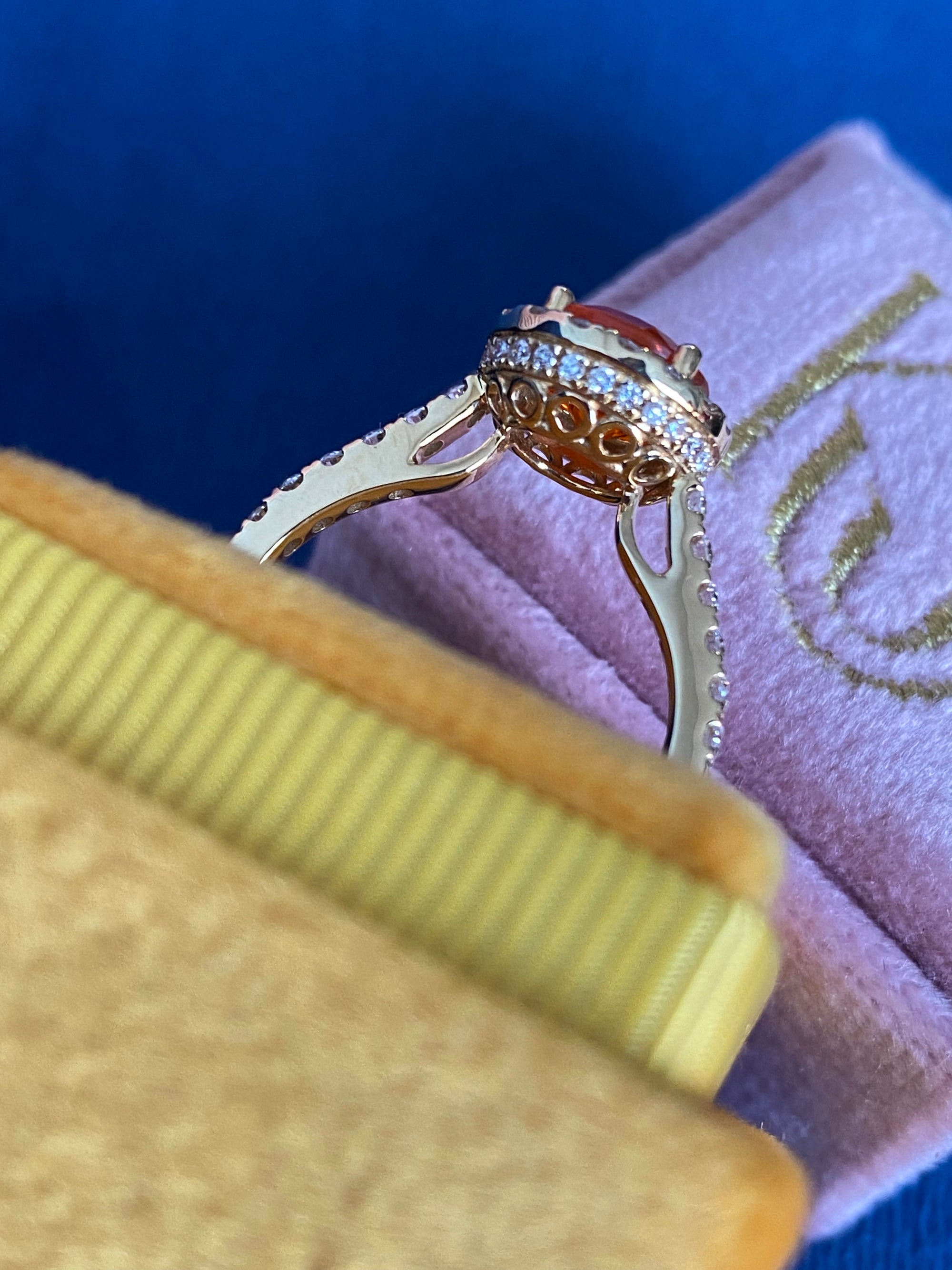 1.37 CTW Fire Opal and Natural Diamond Halo Ring in 18ct Yellow Gold