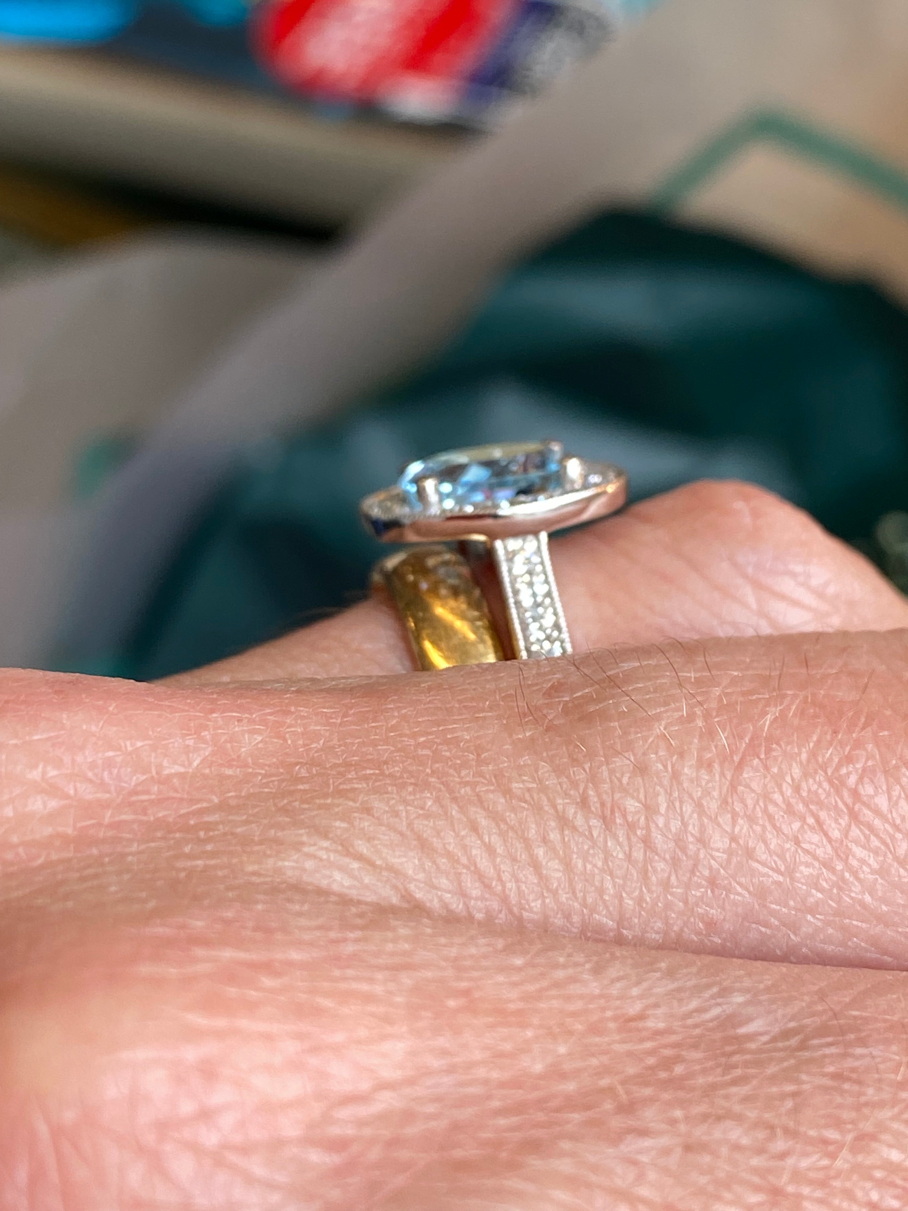 2.33 CTW Oval Cut Aquamarine and Natural Diamond Halo Engagement Ring in 18ct White Gold
