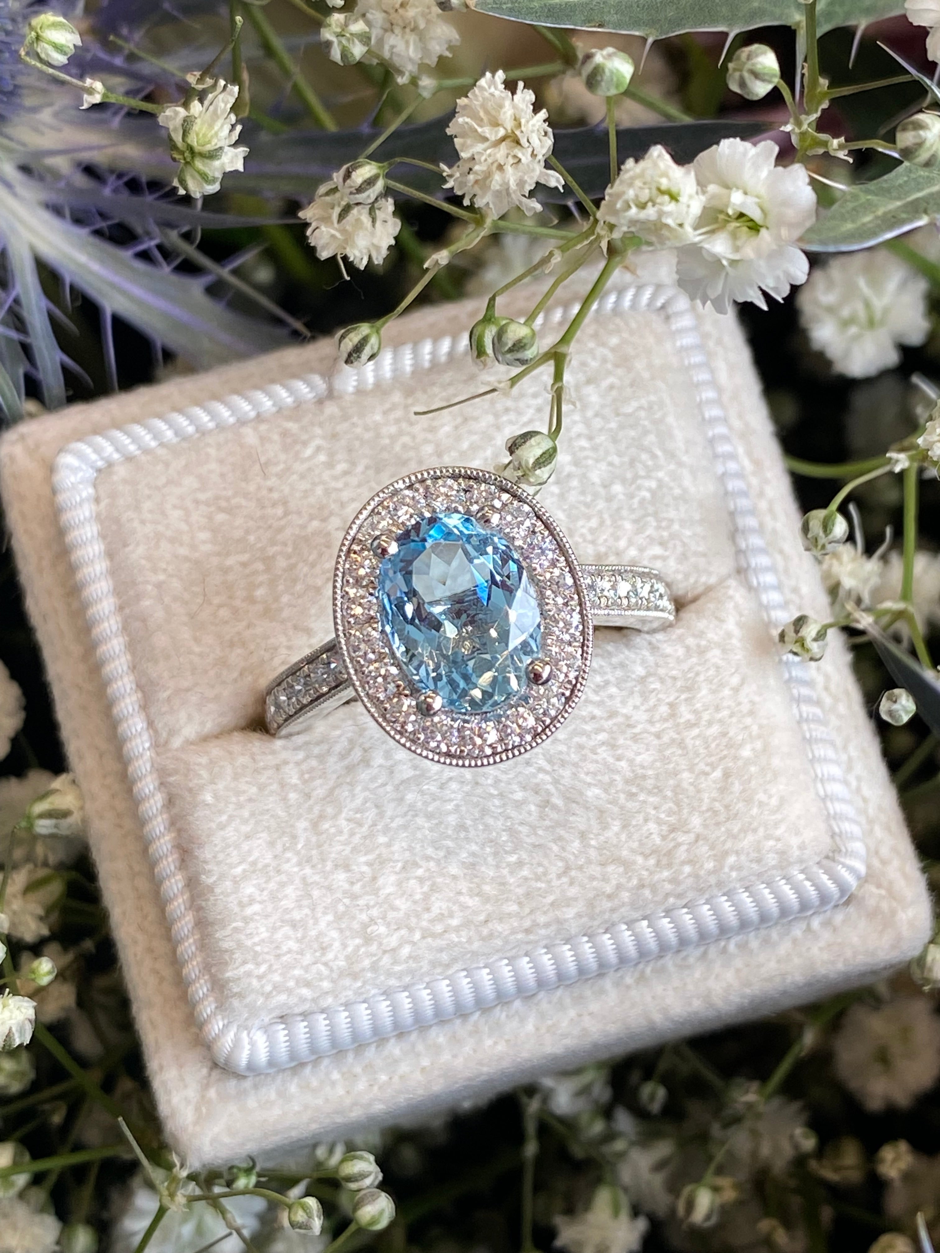 2.33 CTW Oval Cut Aquamarine and Natural Diamond Halo Engagement Ring in 18ct White Gold