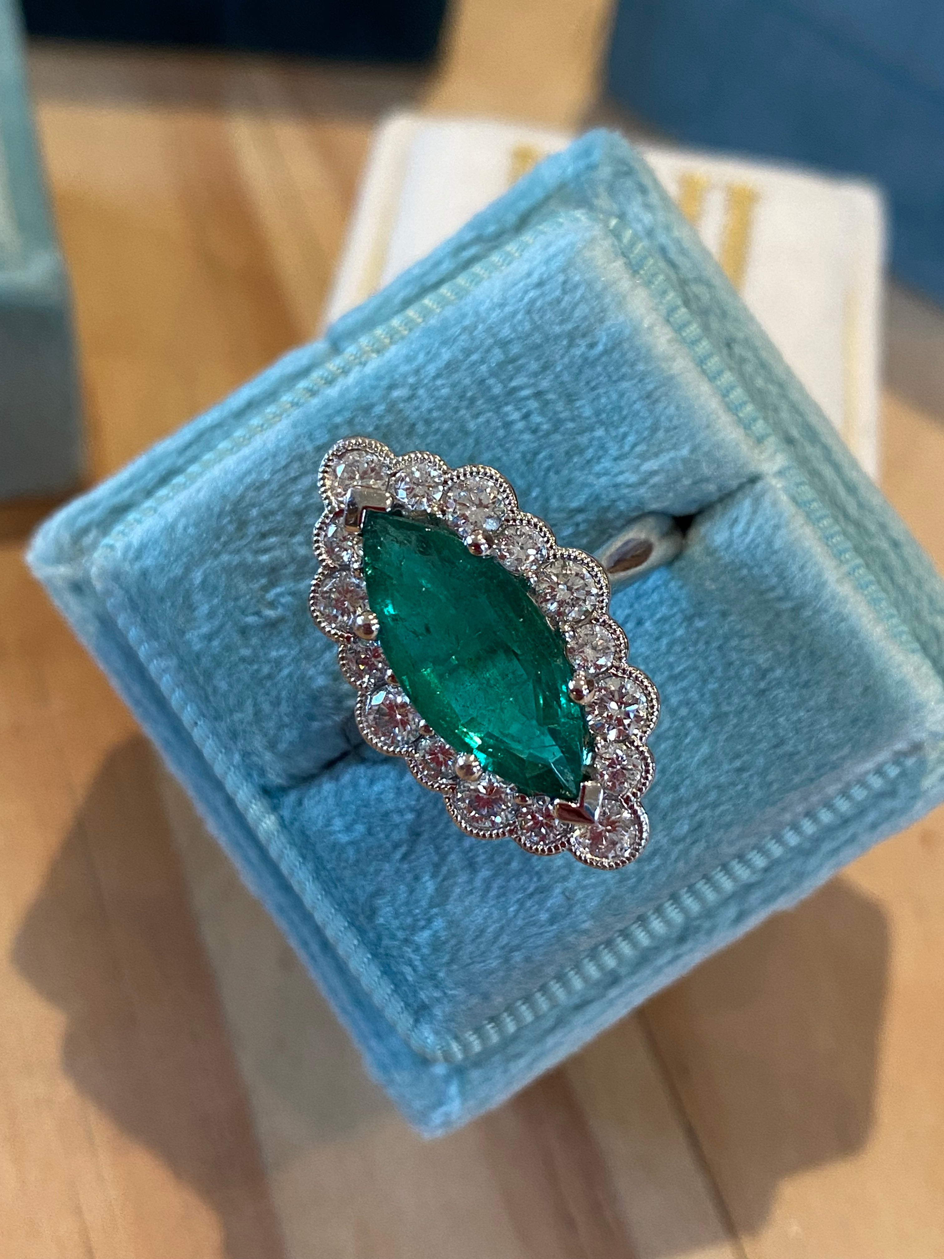 3.47 CTW Marquise Cut Emerald and Natural Diamond Halo Ring in Platinum