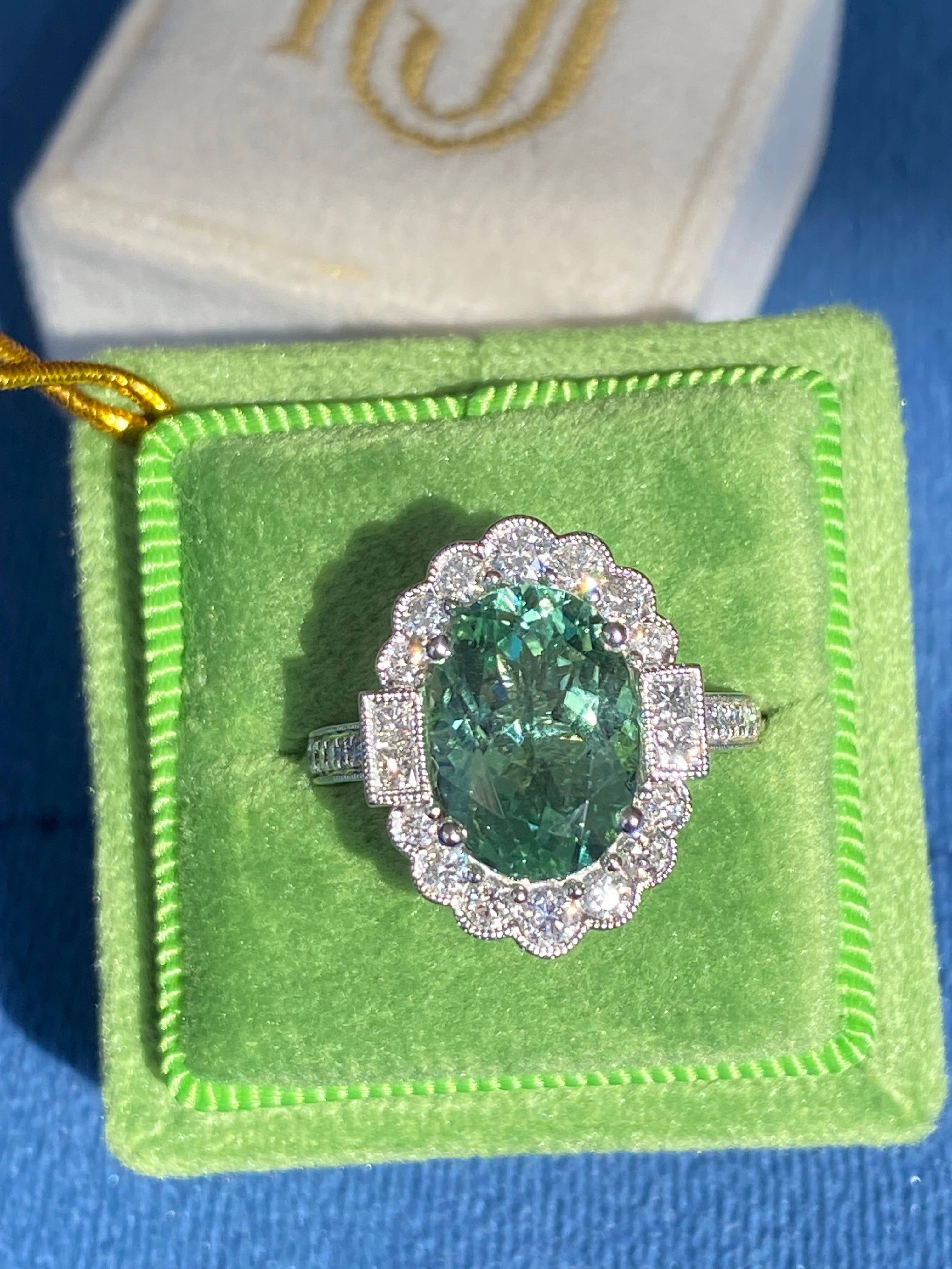 4.07 Carat Oval Cut Mint Tourmaline and 0.80 CTW Natural Diamond Ring in Platinum