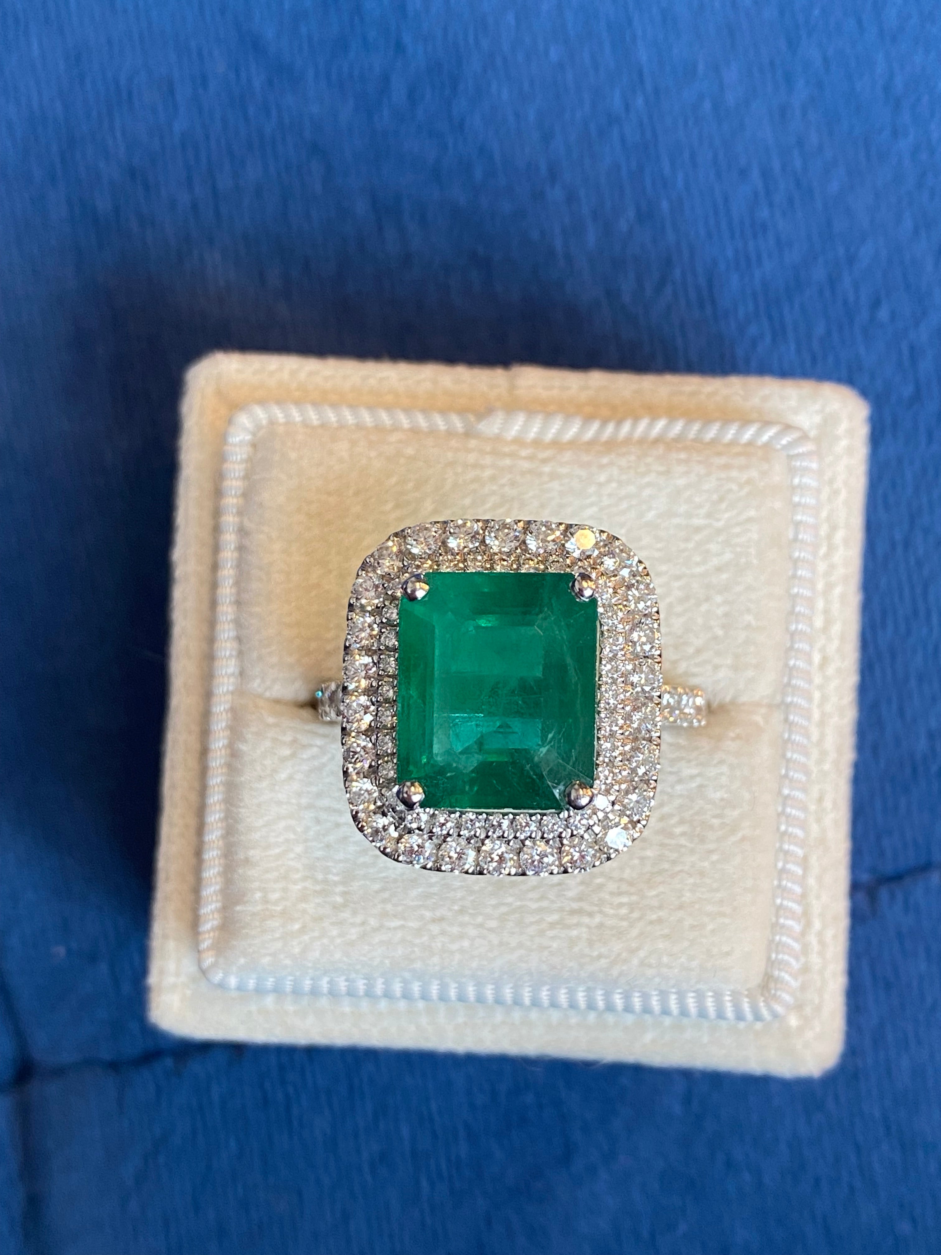 6.07 Carat Emerald Cut Emerald and Diamond Halo Ring in Platinum