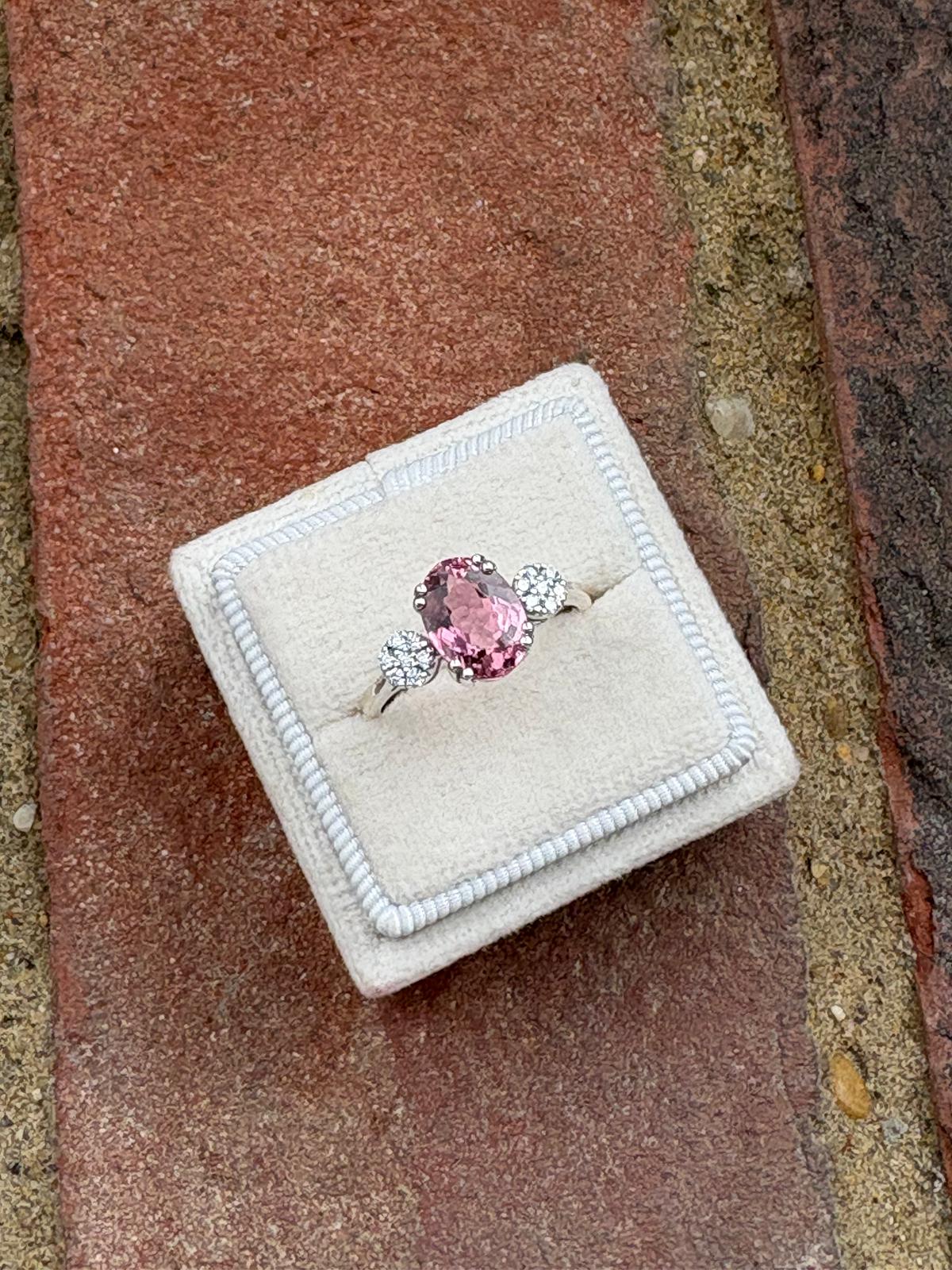 2.05 Carat Pink Tourmaline and Moissanite Three Stone Style Ring in Sterling Silver