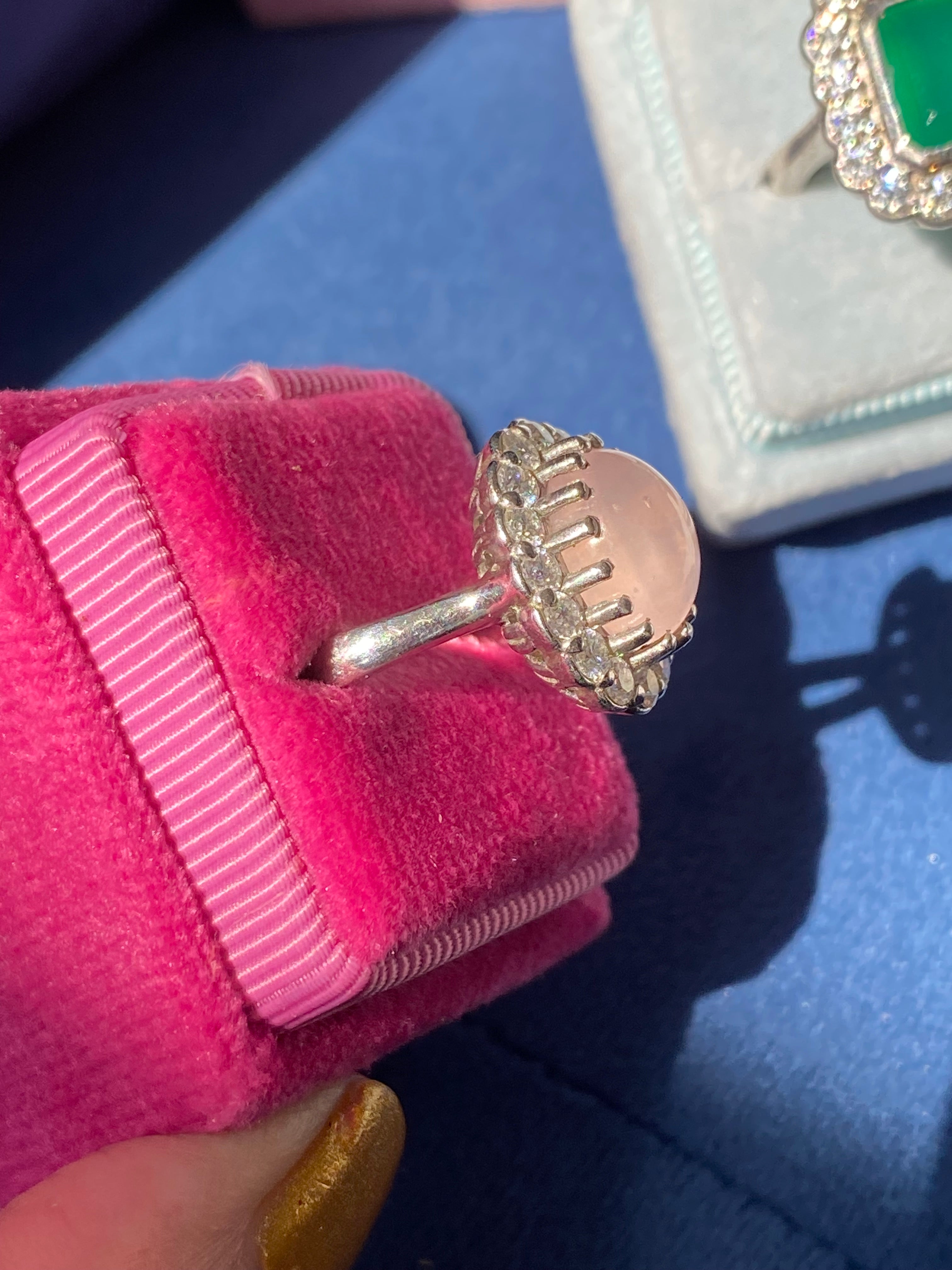 4.50 CTW Oval Cabochon Cut Rose Quartz and Moissanite Halo Cocktail Ring in Sterling Silver