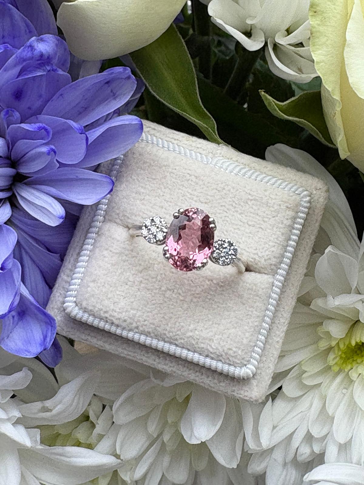 2.05 Carat Pink Tourmaline and Moissanite Three Stone Style Ring in Sterling Silver
