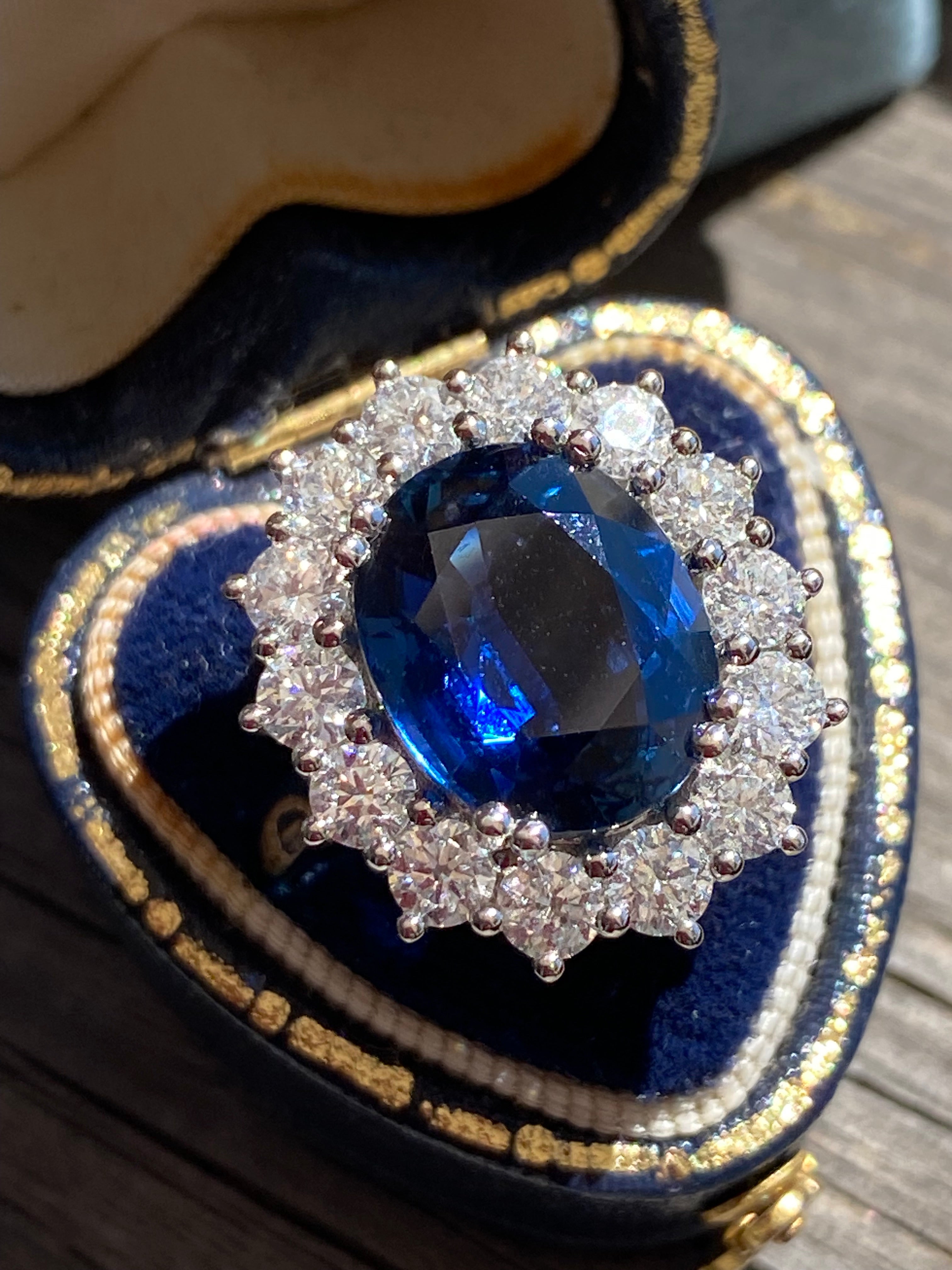 6.37 Carat Gubelin Certed No Heat Blue Ceylon Sapphire and 1.80 CTW Natural Diamond Halo Ring in Platinum