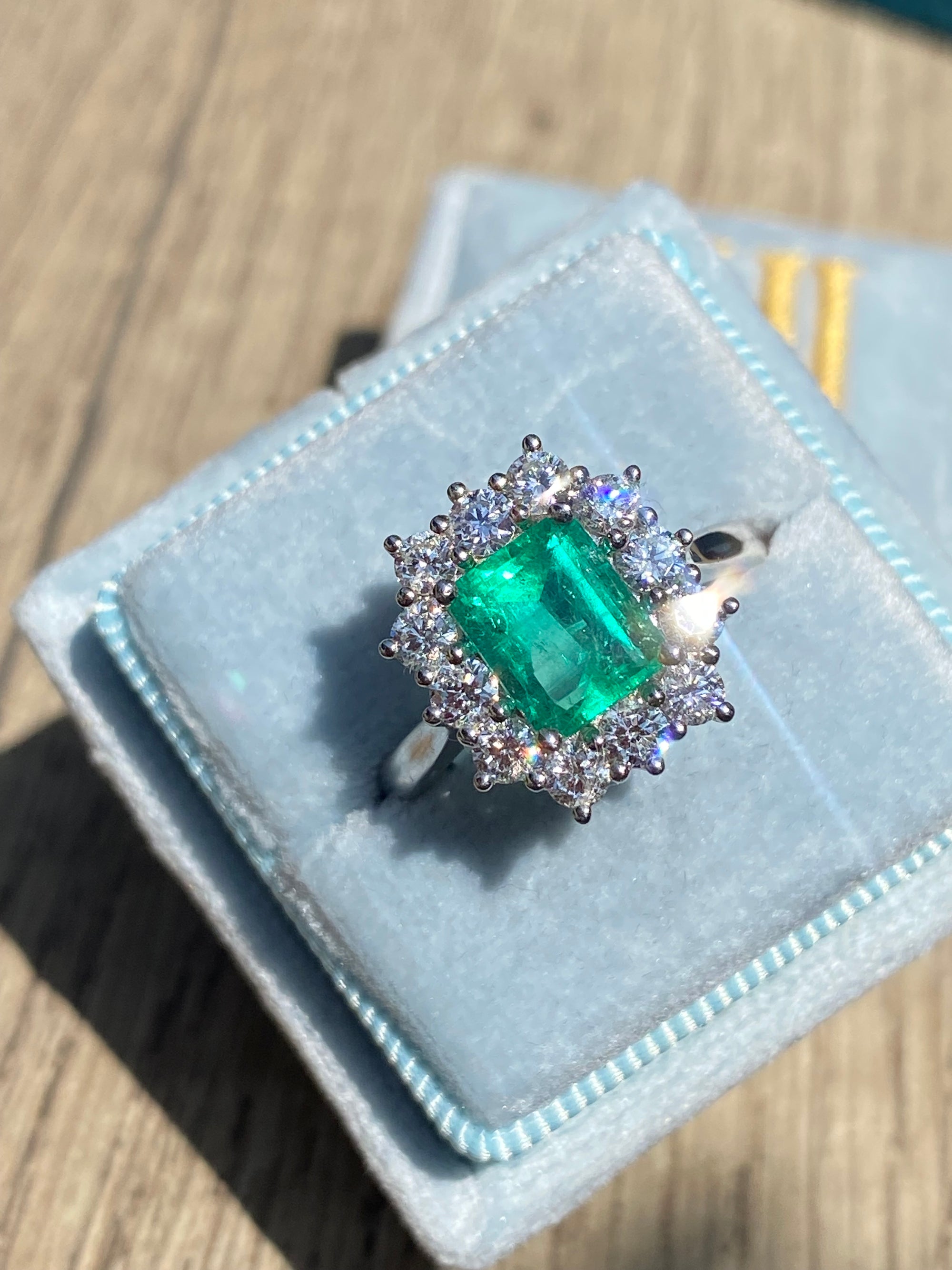 2.34 CTW Emerald Cut Colombian Emerald and Natural Diamond Halo Ring in Platinum