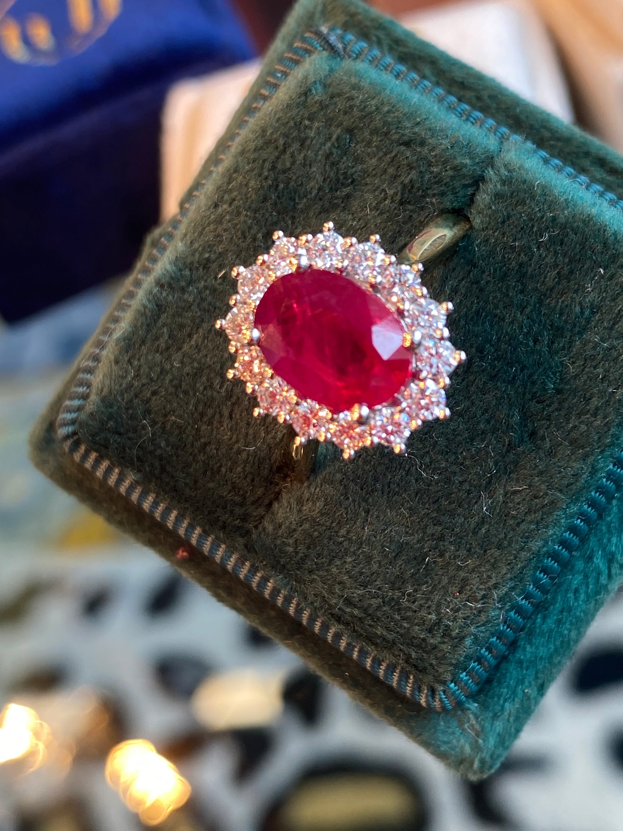 2.95ctw Oval-Cut Ruby and Natural Diamond Halo Ring in Platinum and 18ct Yellow Gold