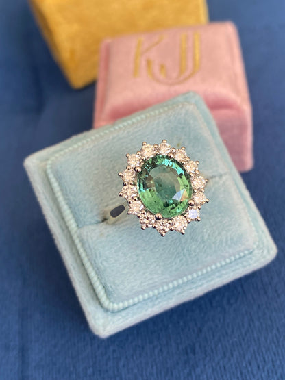 3.06 Carat Blue Tourmaline and Natural Diamond Halo Ring in Platinum and 18ct Yellow Gold