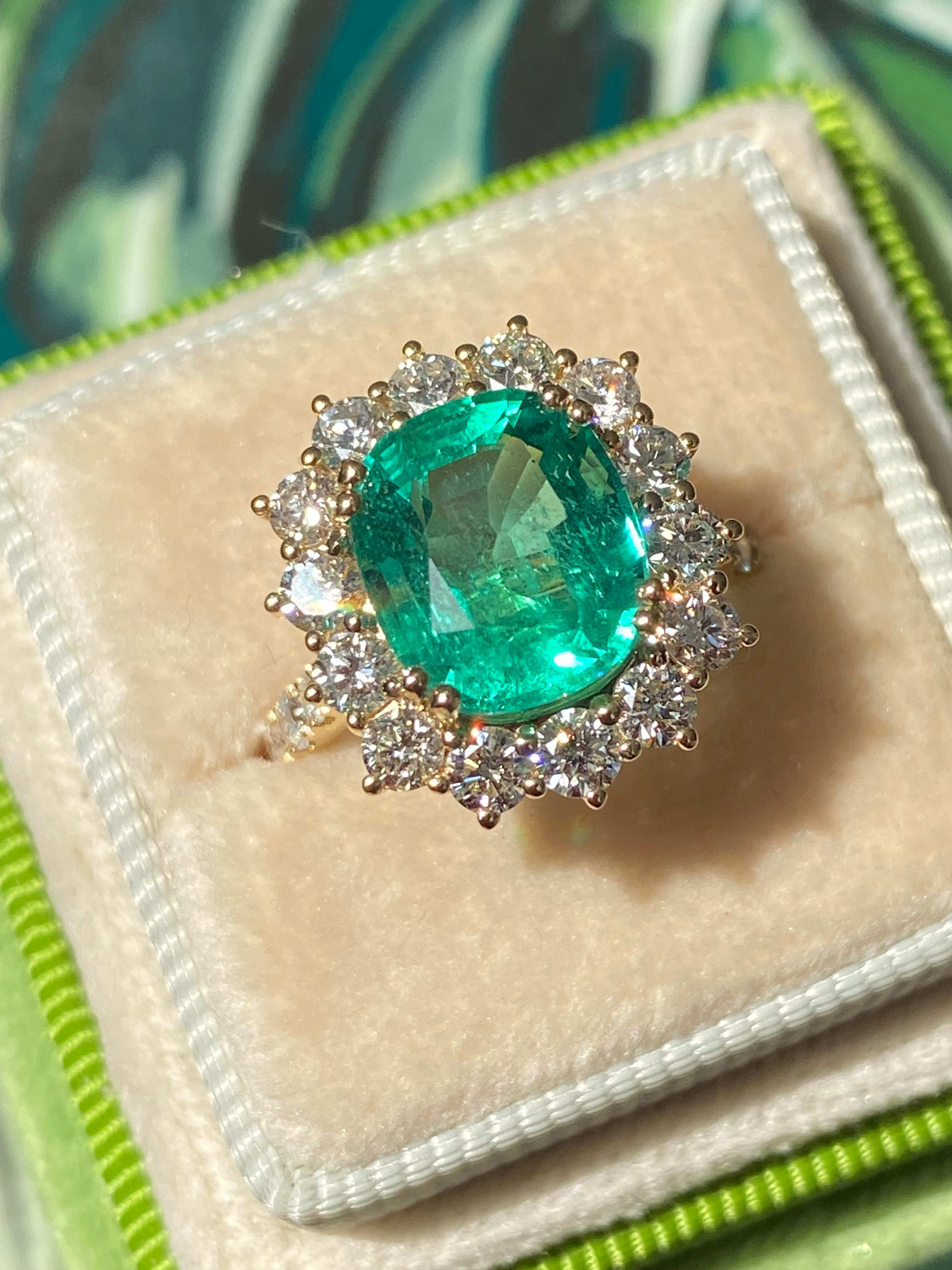 5.31 CTW Cushion Cut Emerald and Natural Diamond Halo Ring in 18ct Yellow Gold