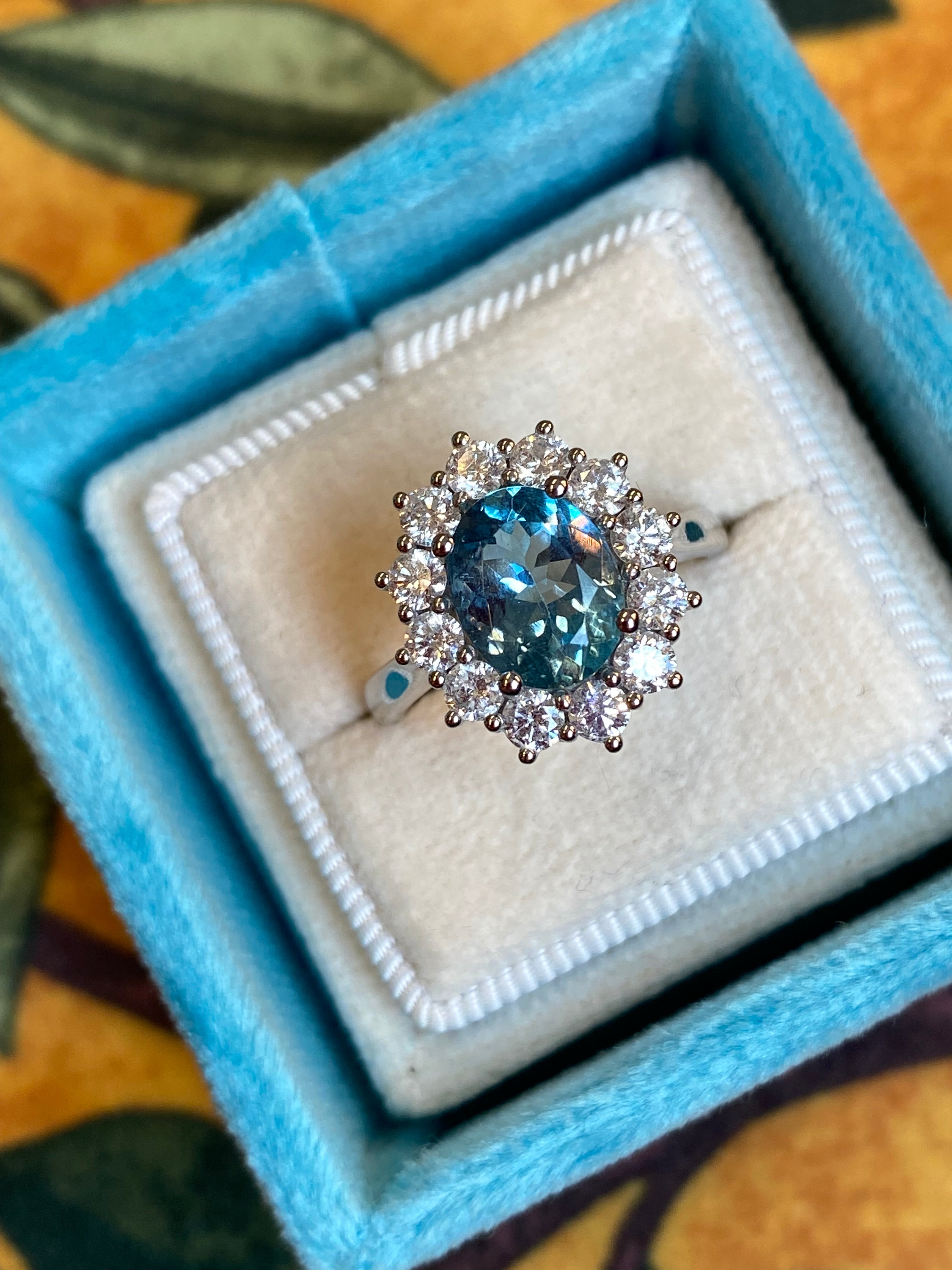 2.68 CTW Oval Cut Aquamarine and Natural Diamond Halo Engagement Ring in Platinum