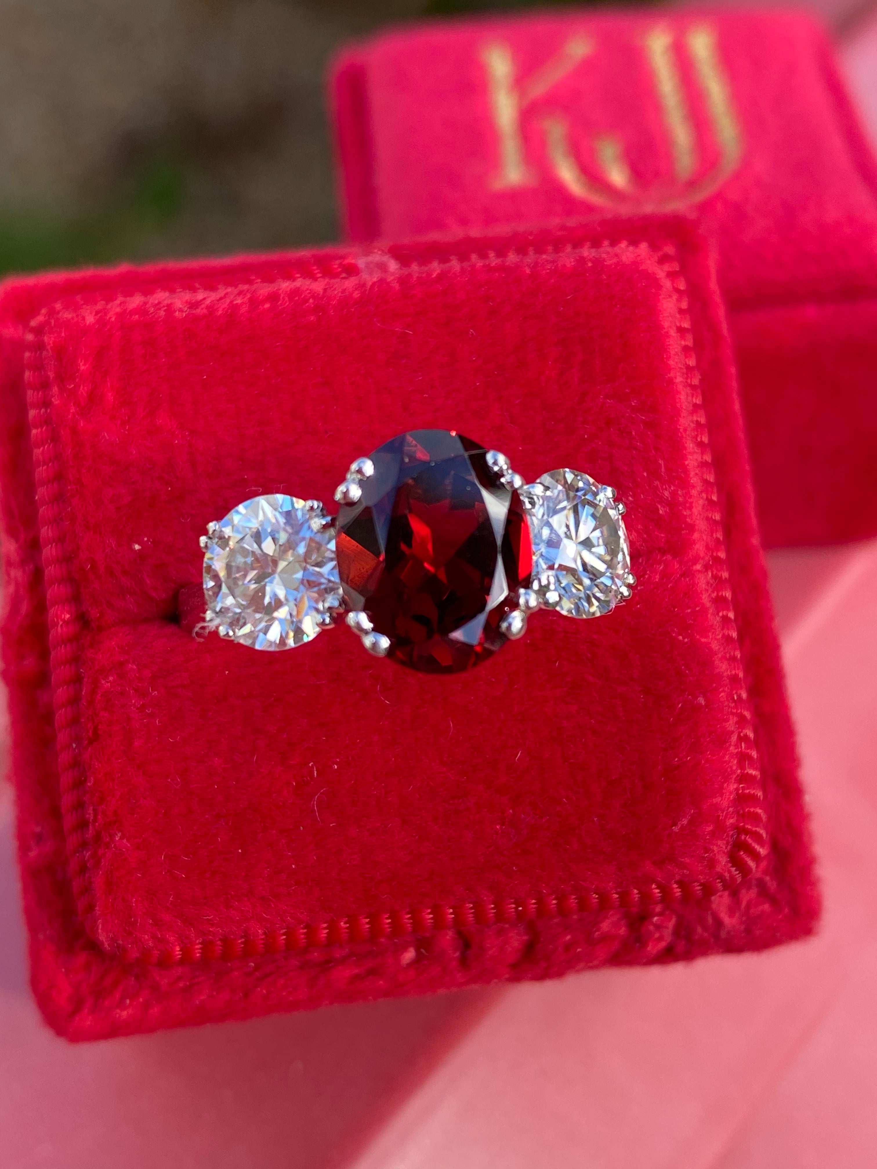 2.57 Carat Garnet and 1.84 Carat Moissanite Three Stone Ring in Sterling Silver