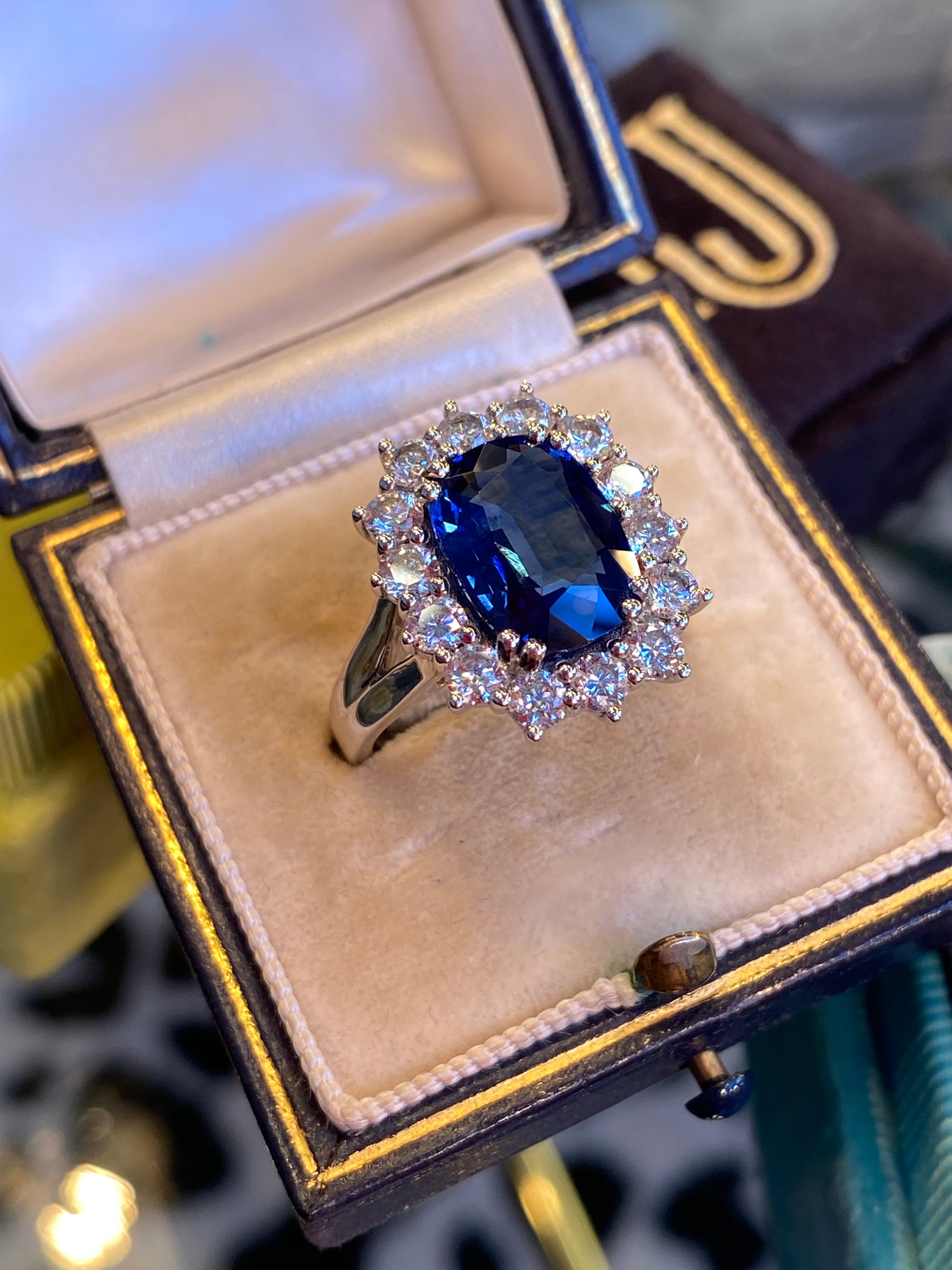 4.05 Carat Blue Ceylon Sapphire and 1.38 CTW Natural Diamond Halo Ring in Platinum
