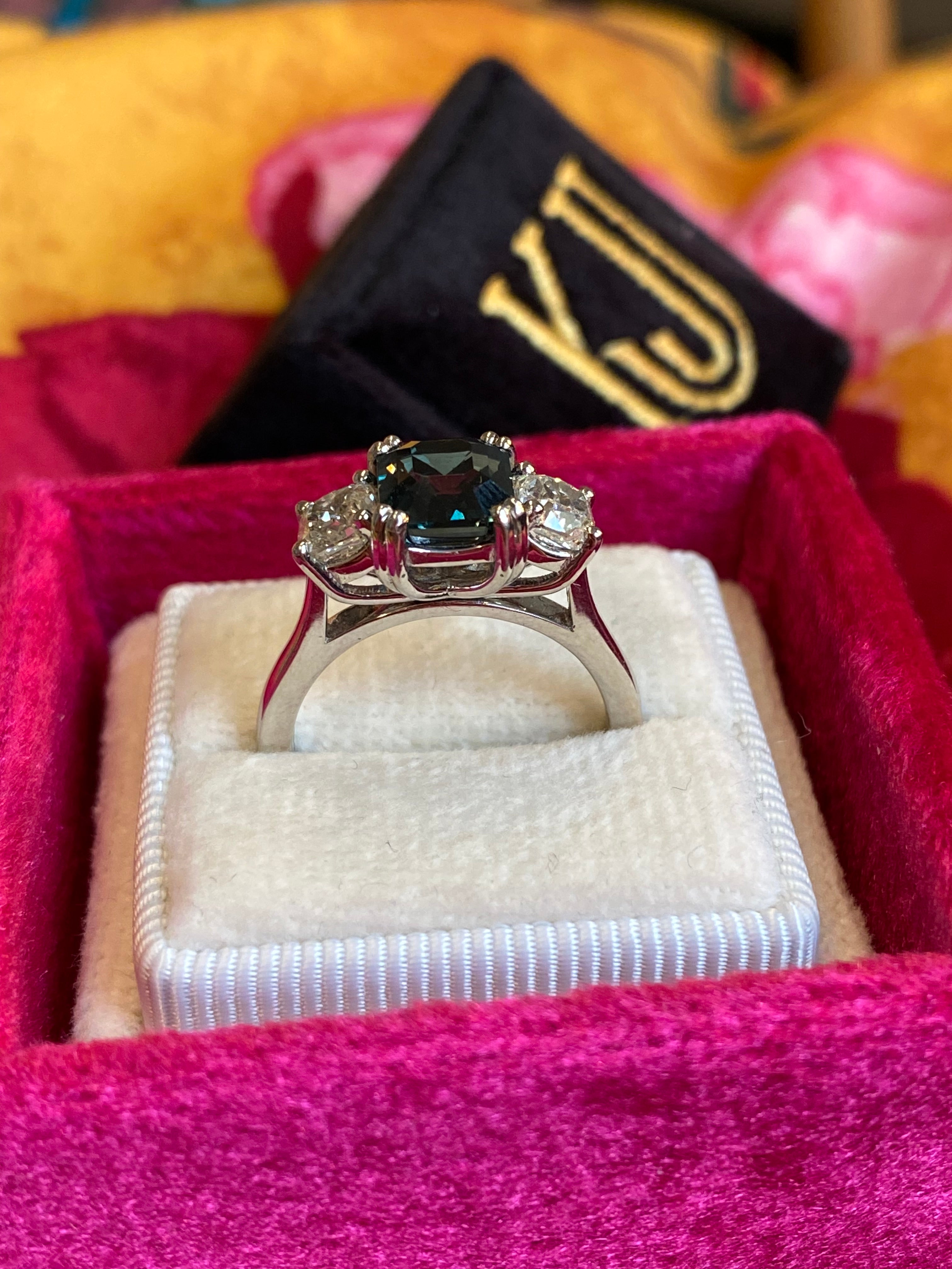 2.42 Carat Teal Sapphire and 0.97 CTW Natural Diamond Three Stone Ring in Platinum