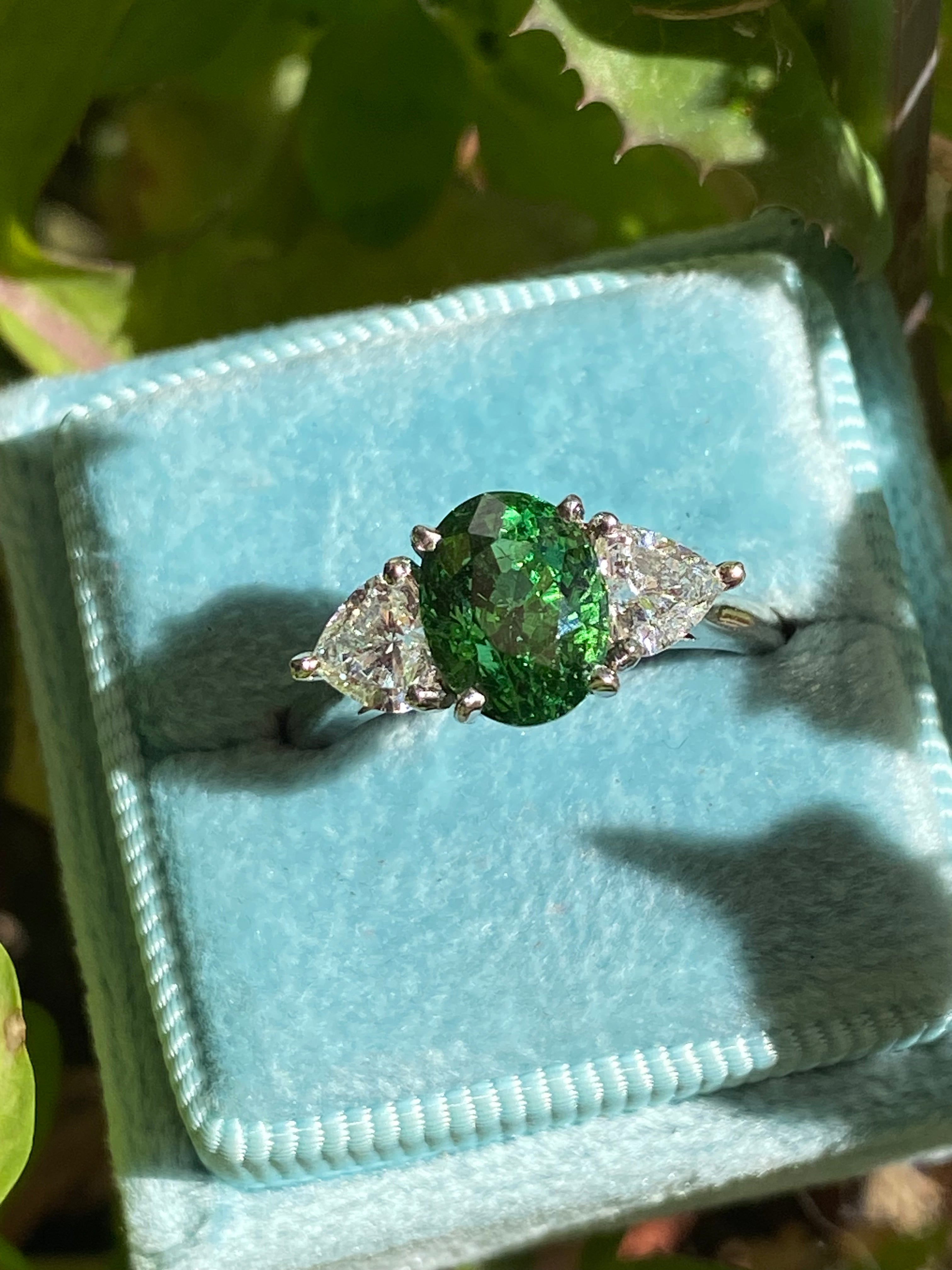 2.49 Carat Tsavorite Garnet and 0.83 Carat Diamond Three Stone Engagement Ring in Platinum