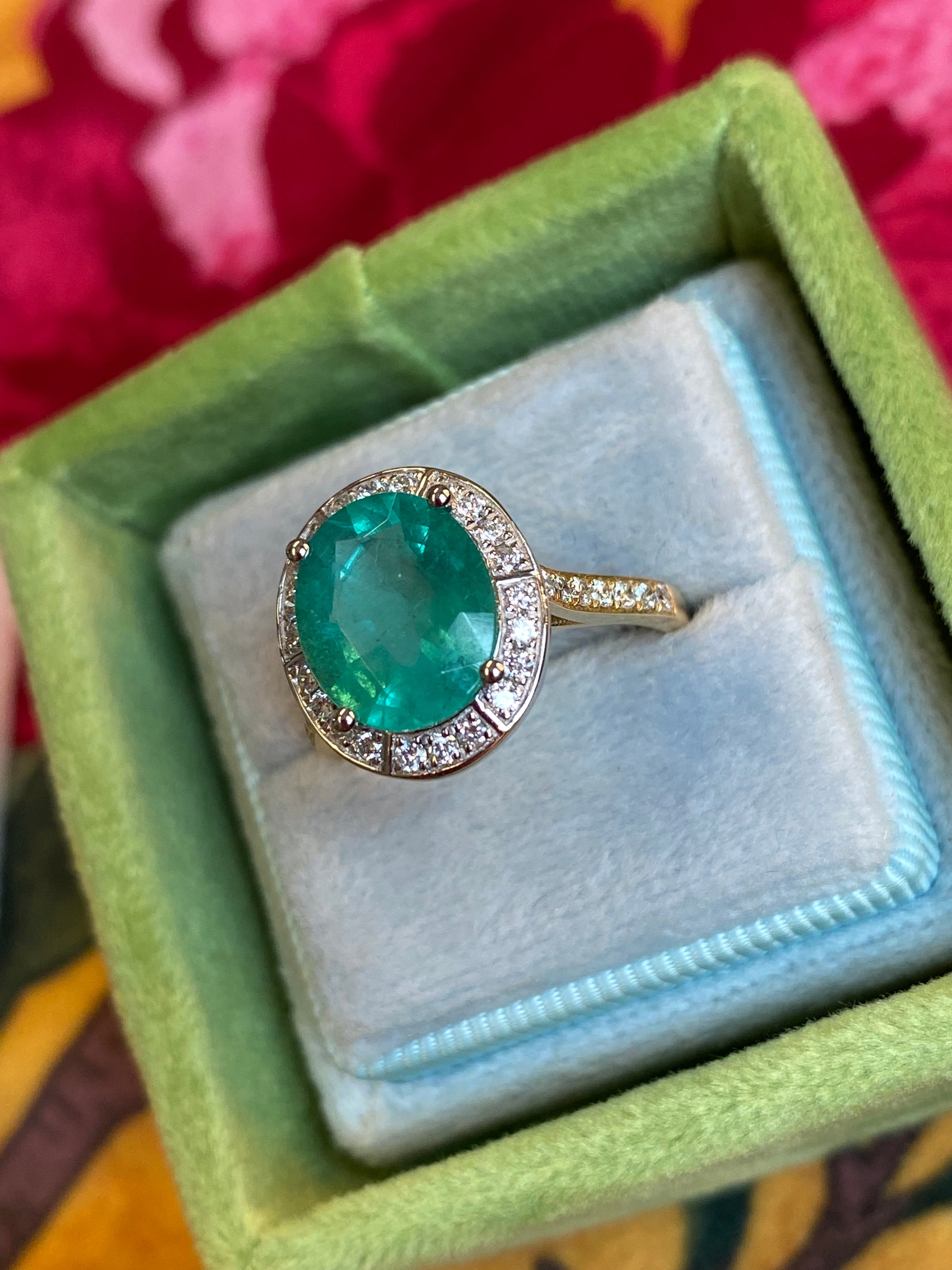 3.21 CTW Oval Cut Emerald and Natural Diamond Halo Engagement Ring in Platinum and 18ct Yellow Gold