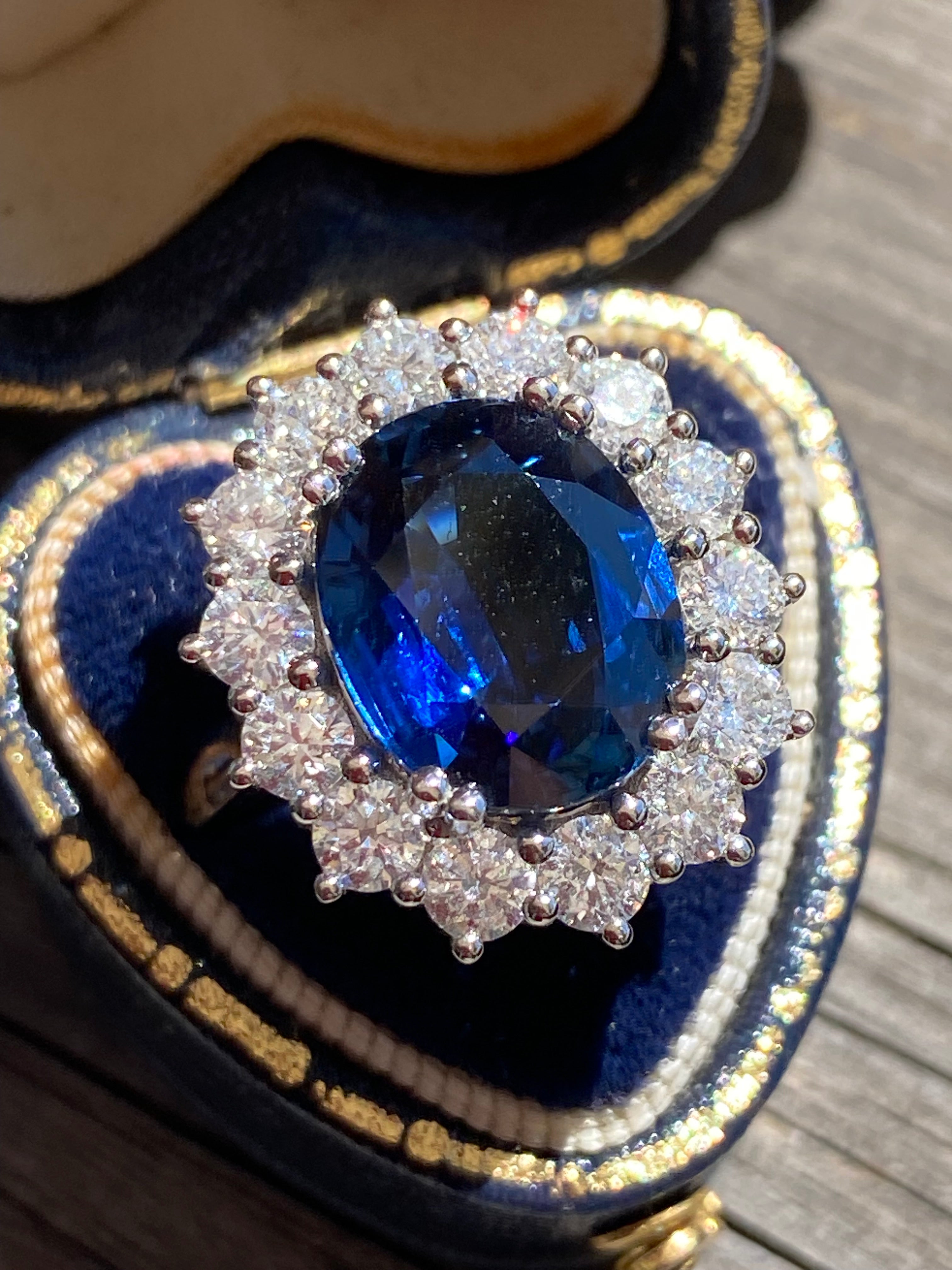 6.37 Carat Gubelin Certed No Heat Blue Ceylon Sapphire and 1.80 CTW Natural Diamond Halo Ring in Platinum
