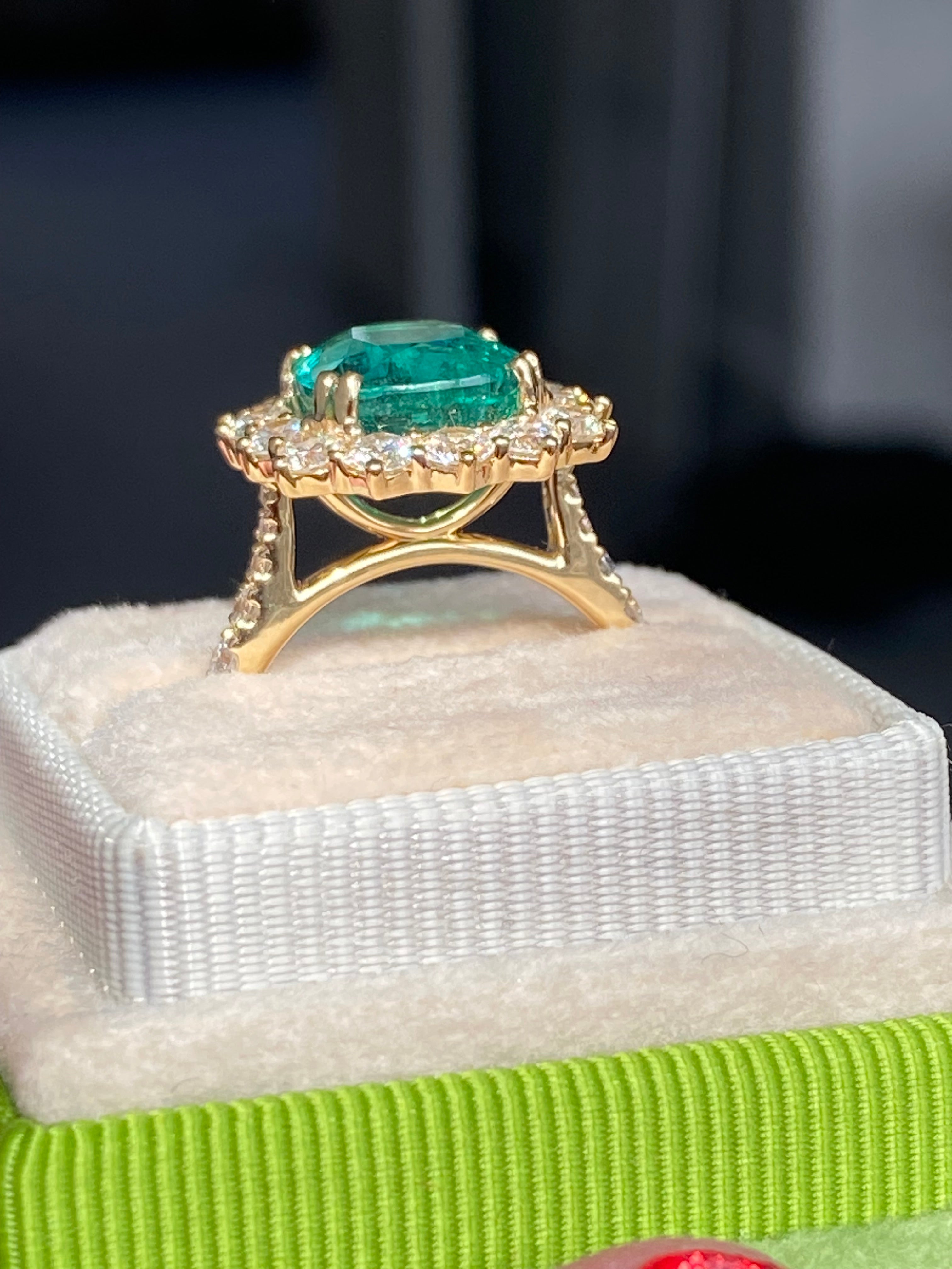 5.31 CTW Cushion Cut Emerald and Natural Diamond Halo Ring in 18ct Yellow Gold