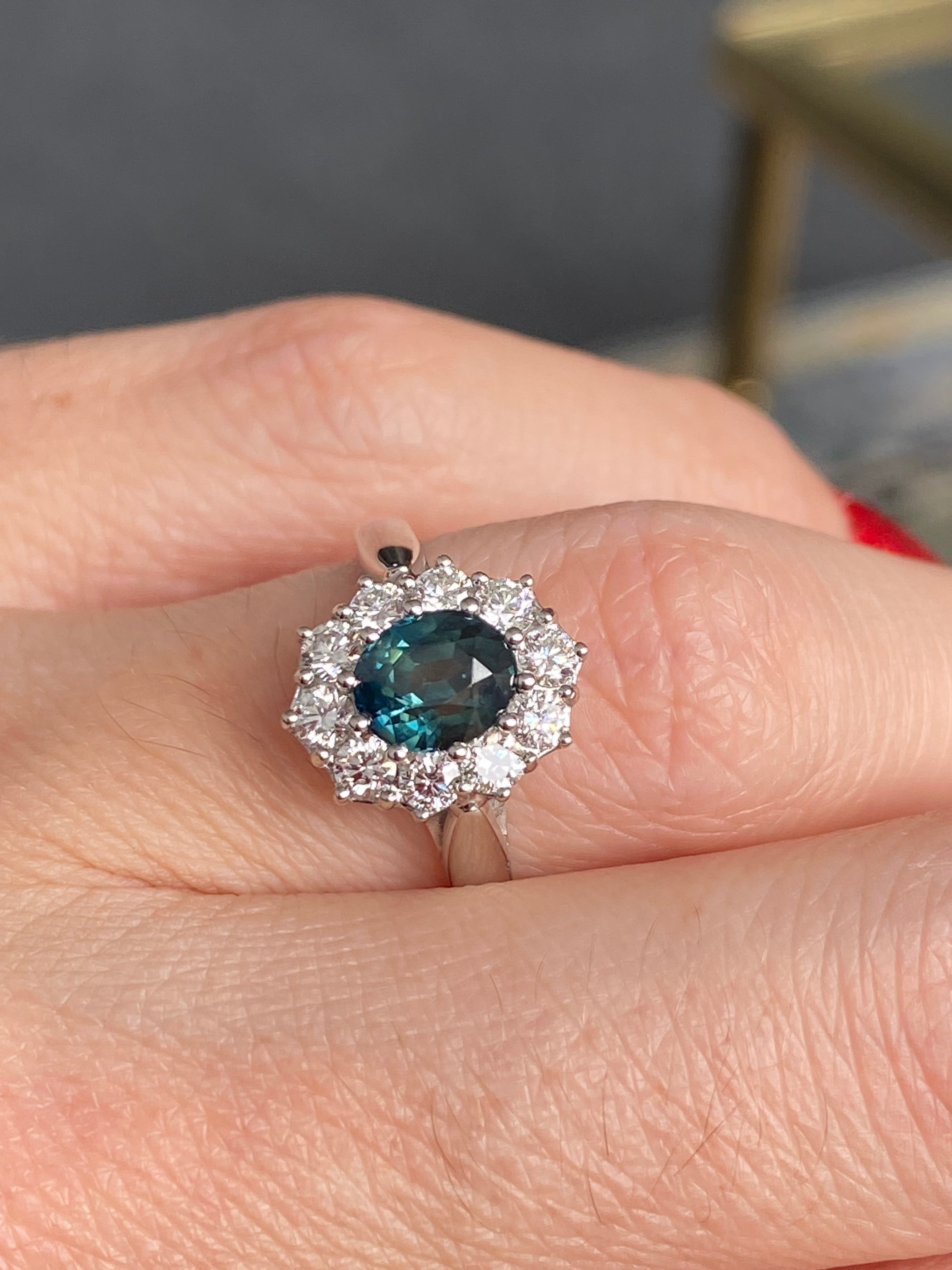 2.18 CTW Oval Cut Teal Sapphire and Natural Diamond Halo Ring in Platinum