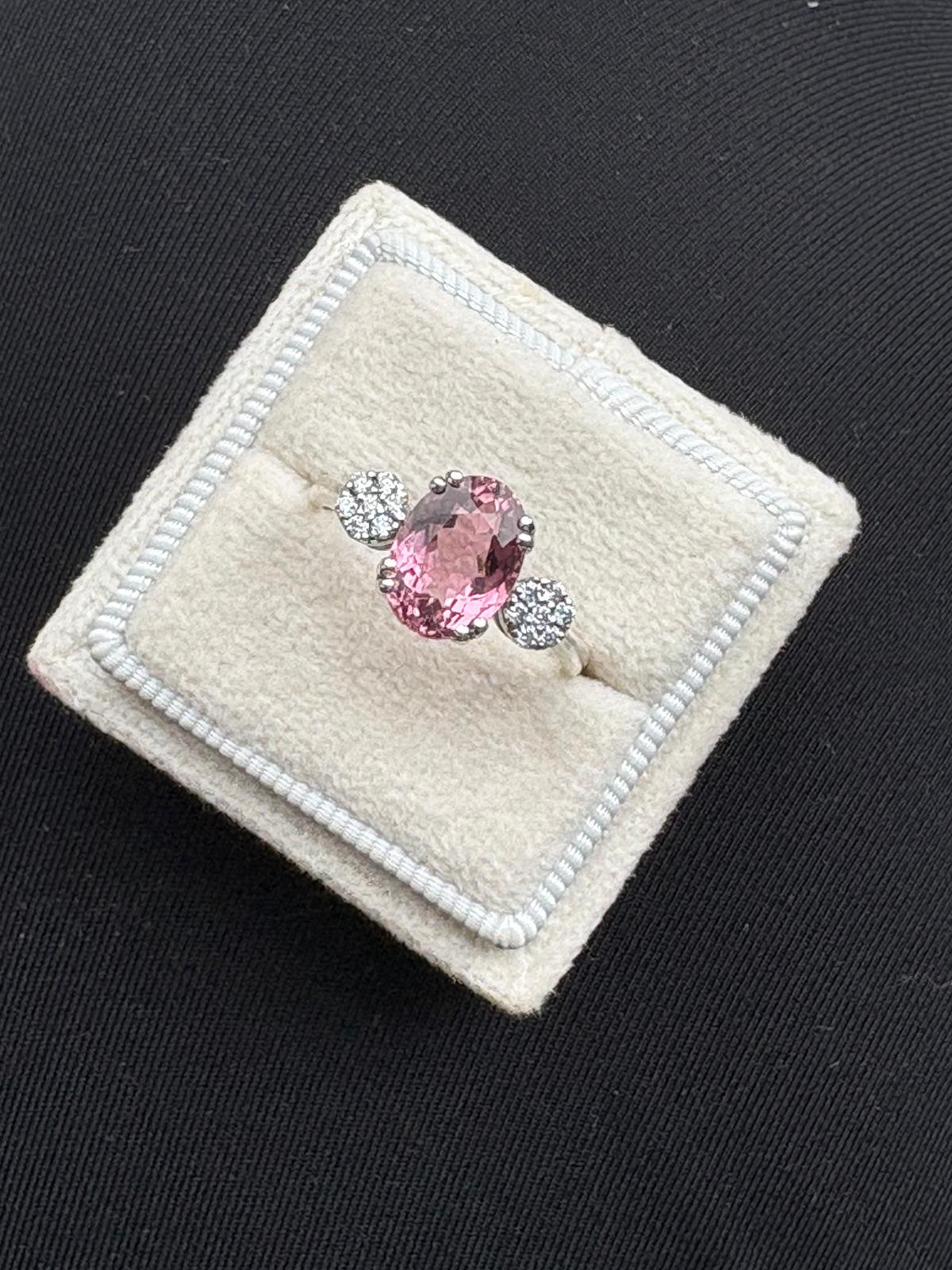 2.05 Carat Pink Tourmaline and Moissanite Three Stone Style Ring in Sterling Silver