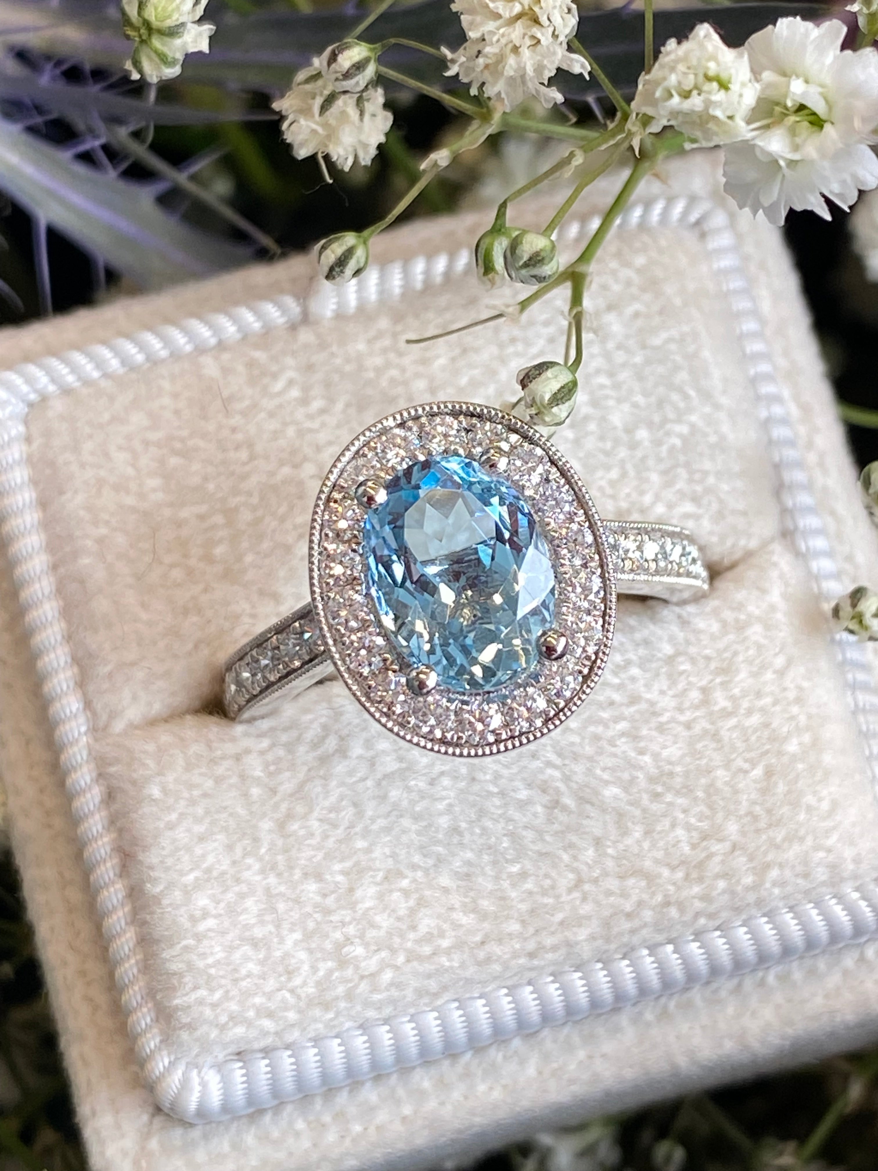 2.33 CTW Oval Cut Aquamarine and Natural Diamond Halo Engagement Ring in 18ct White Gold