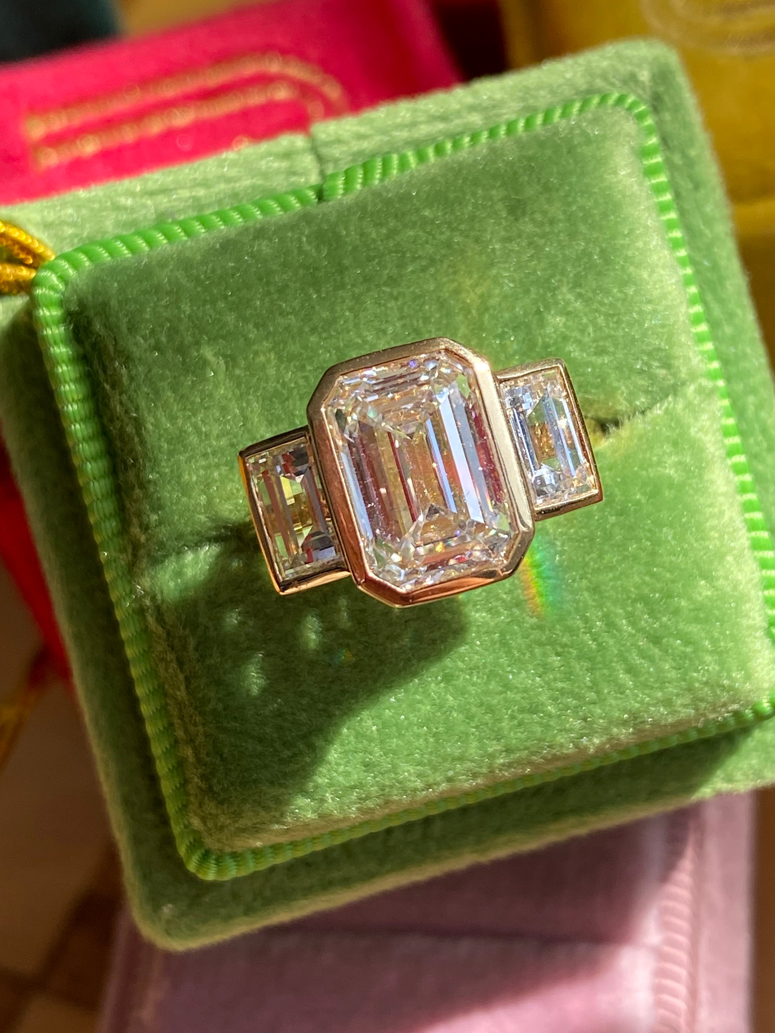 4.32 CTW Emerald Cut Bezel Set Lab Diamond Ring in 18ct Yellow Gold