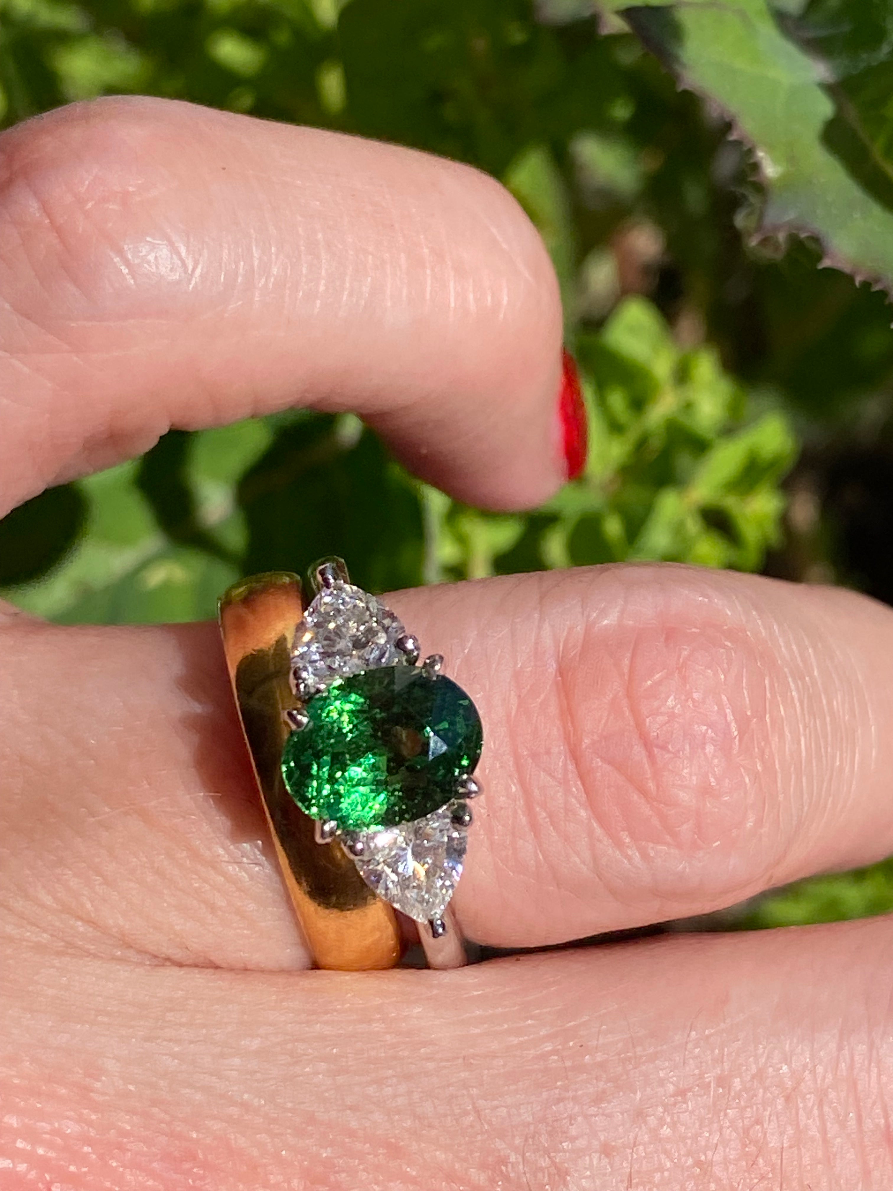 2.49 Carat Tsavorite Garnet and 0.83 Carat Diamond Three Stone Engagement Ring in Platinum