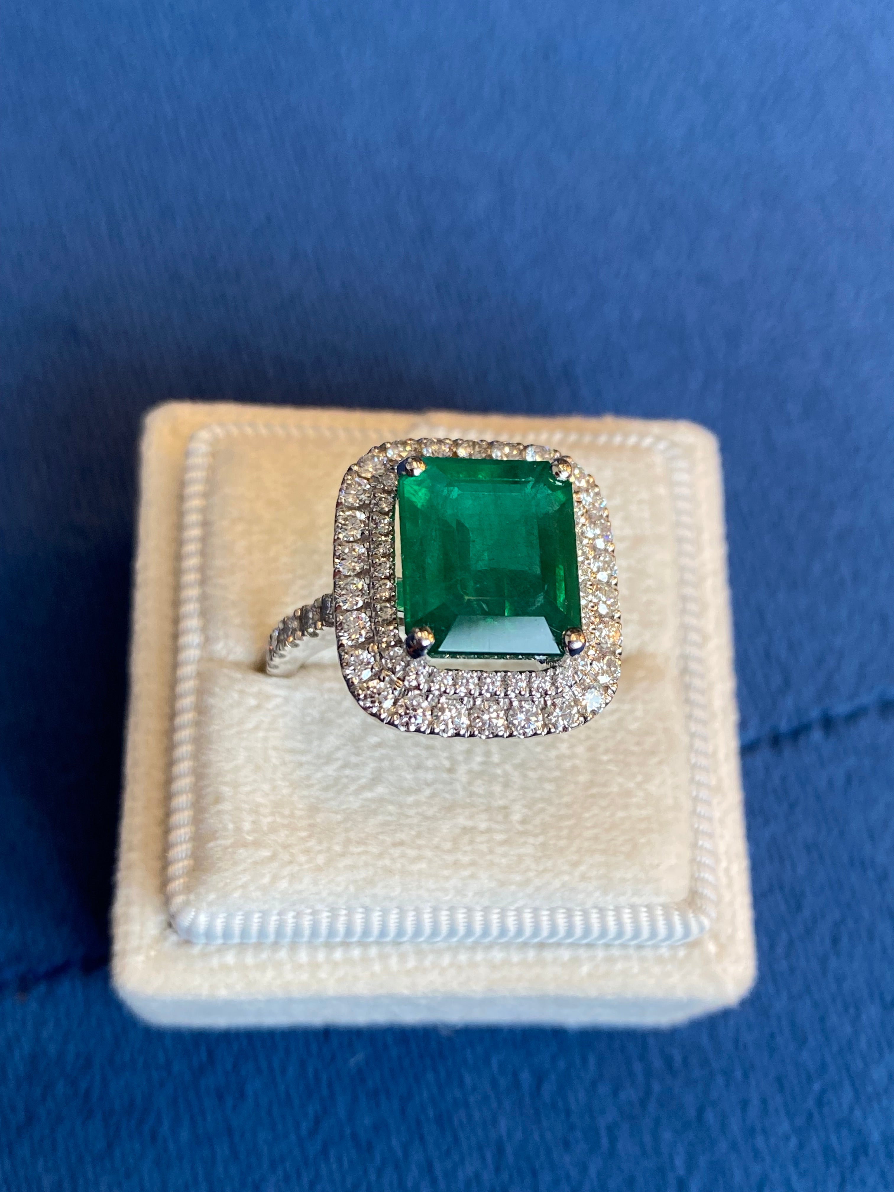 6.07 Carat Emerald Cut Emerald and Diamond Halo Ring in Platinum