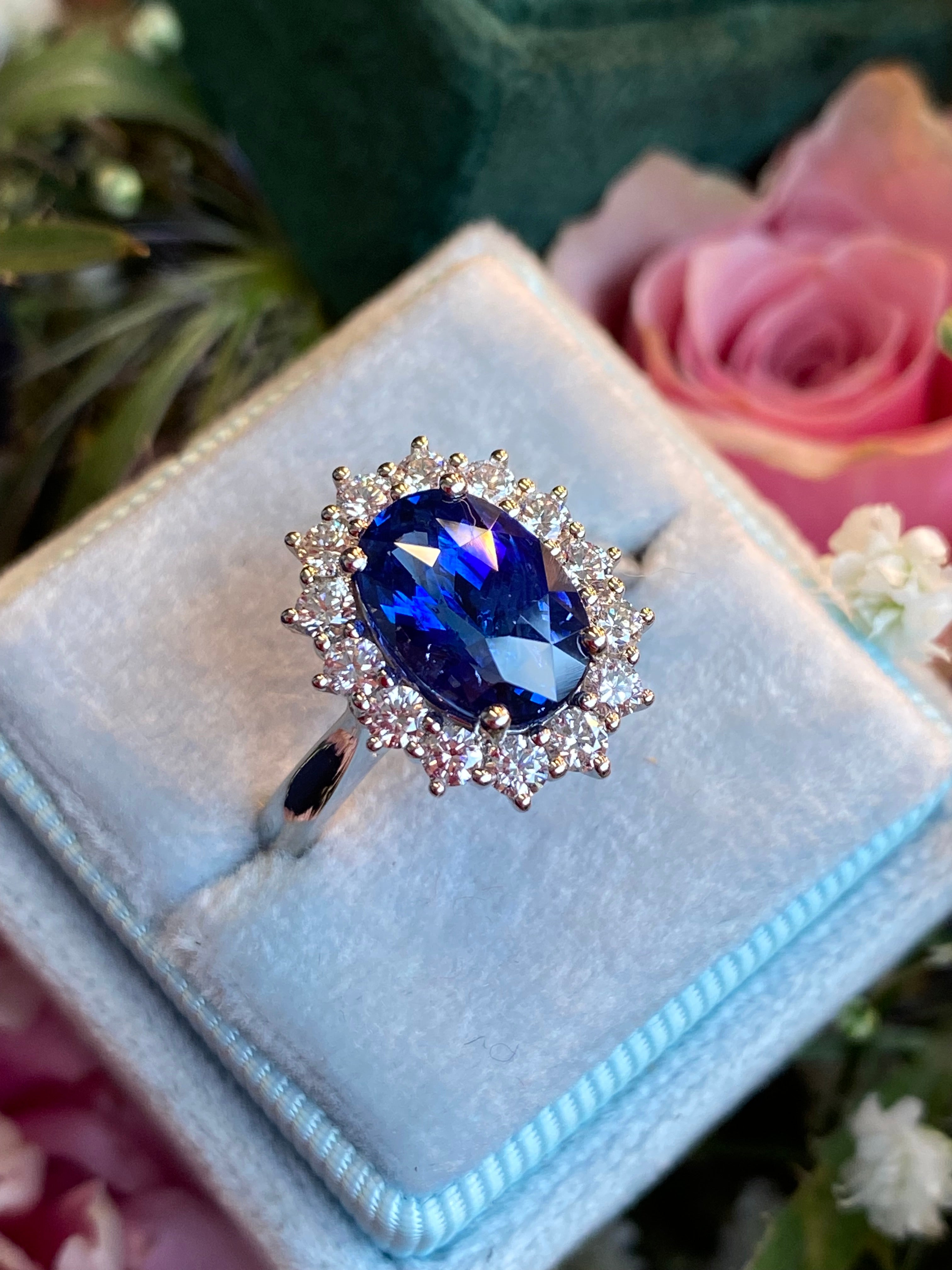3.04 Carat Blue Ceylon Sapphire and 0.63 CTW Natural Diamond Halo Ring in Platinum