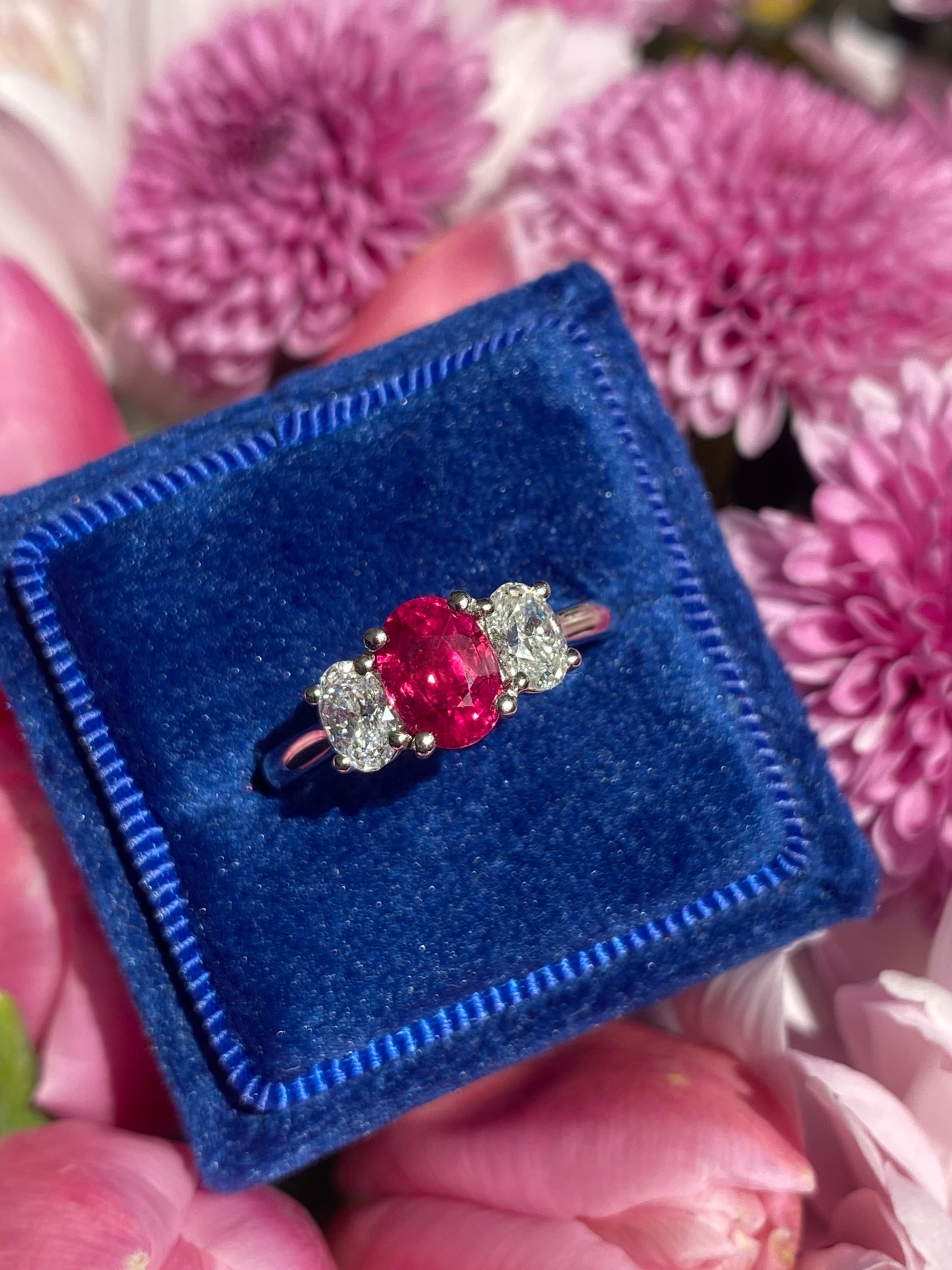 1.34 Carat Ruby and 0.66 Natural Diamond Three Stone Ring in Platinum