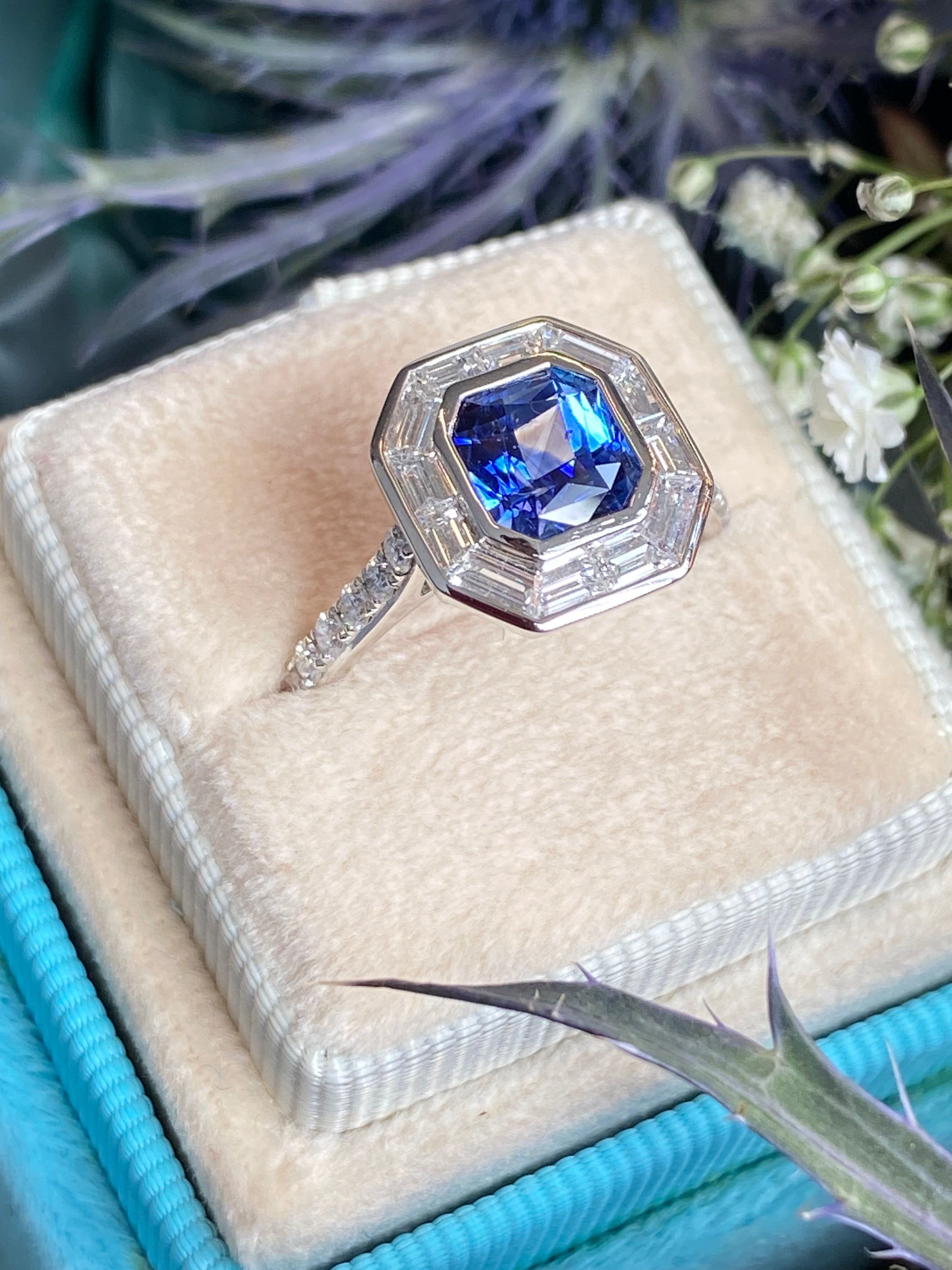 2.10 Carat Blue Ceylon Sapphire and 1.09 CTW Natural Diamond Halo Ring in Platinum