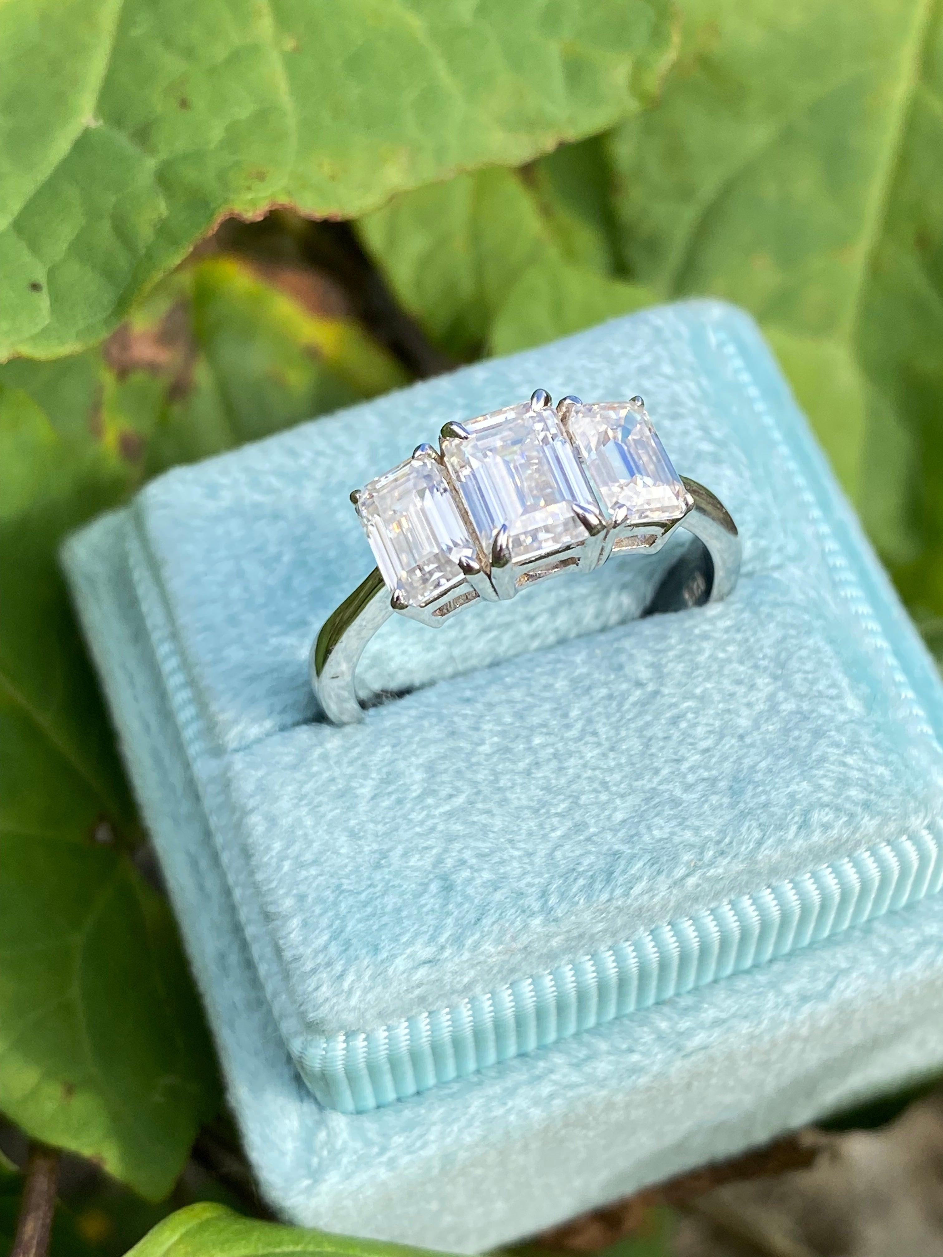 2.00 CTW Emerald Cut Moissanite Three Stone Engagement Ring in Sterling Silver
