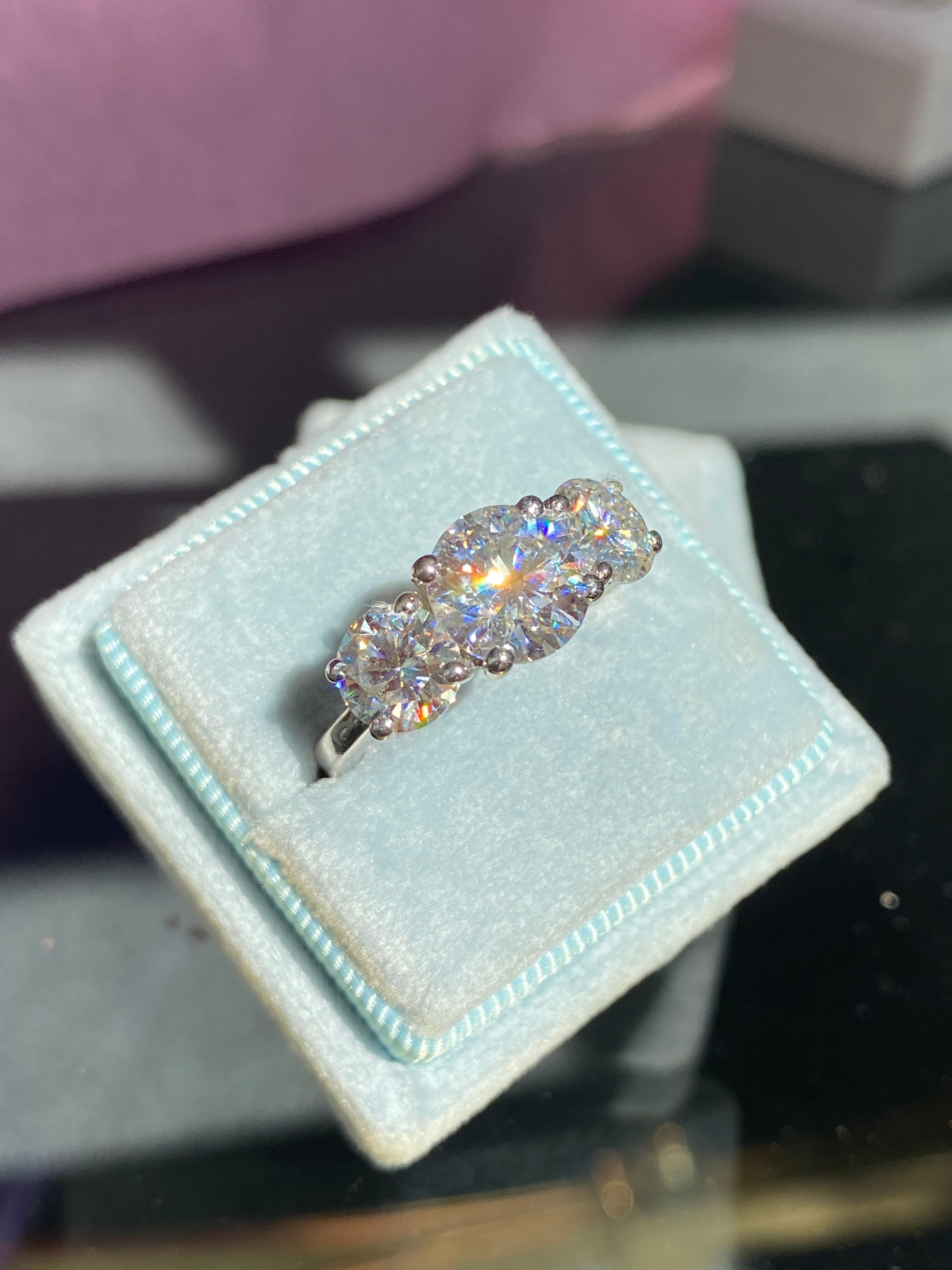 4.00 CTW Round Cut Moissanite Three Stone Ring in Sterling Silver