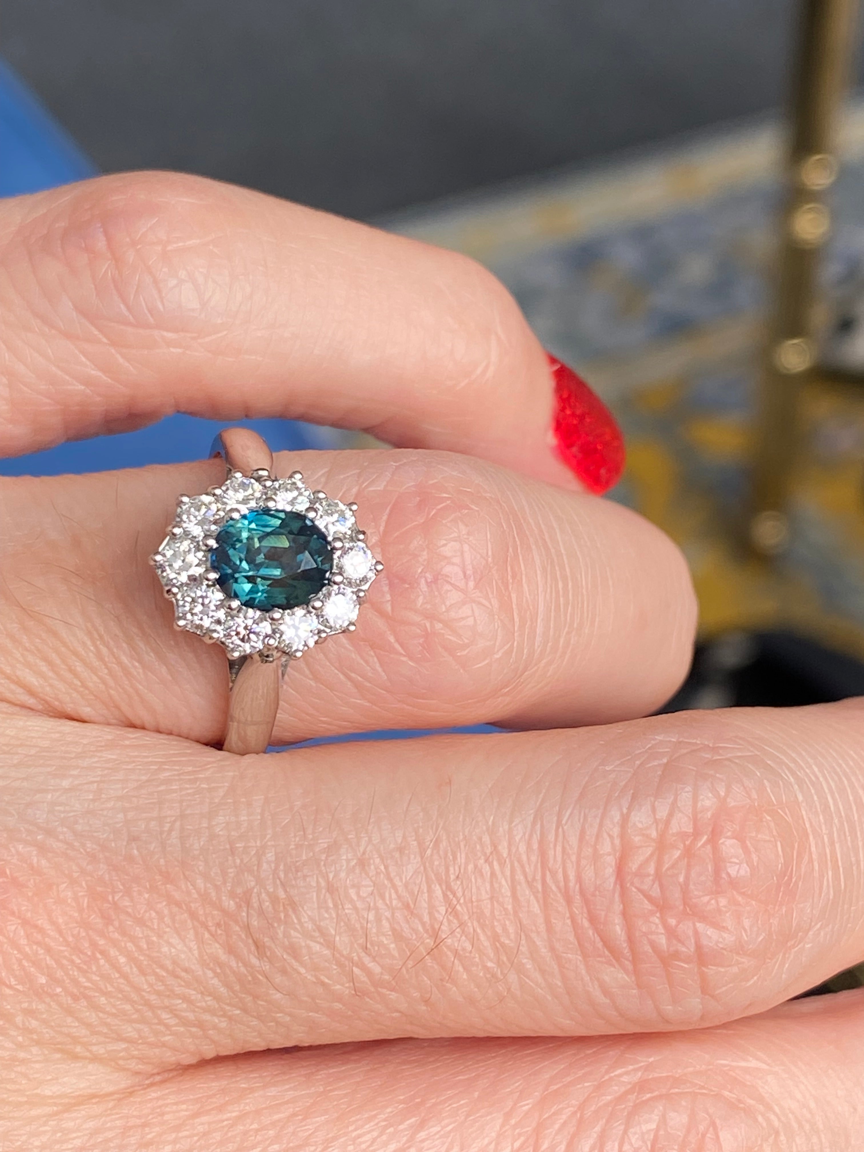 2.18 CTW Oval Cut Teal Sapphire and Natural Diamond Halo Ring in Platinum