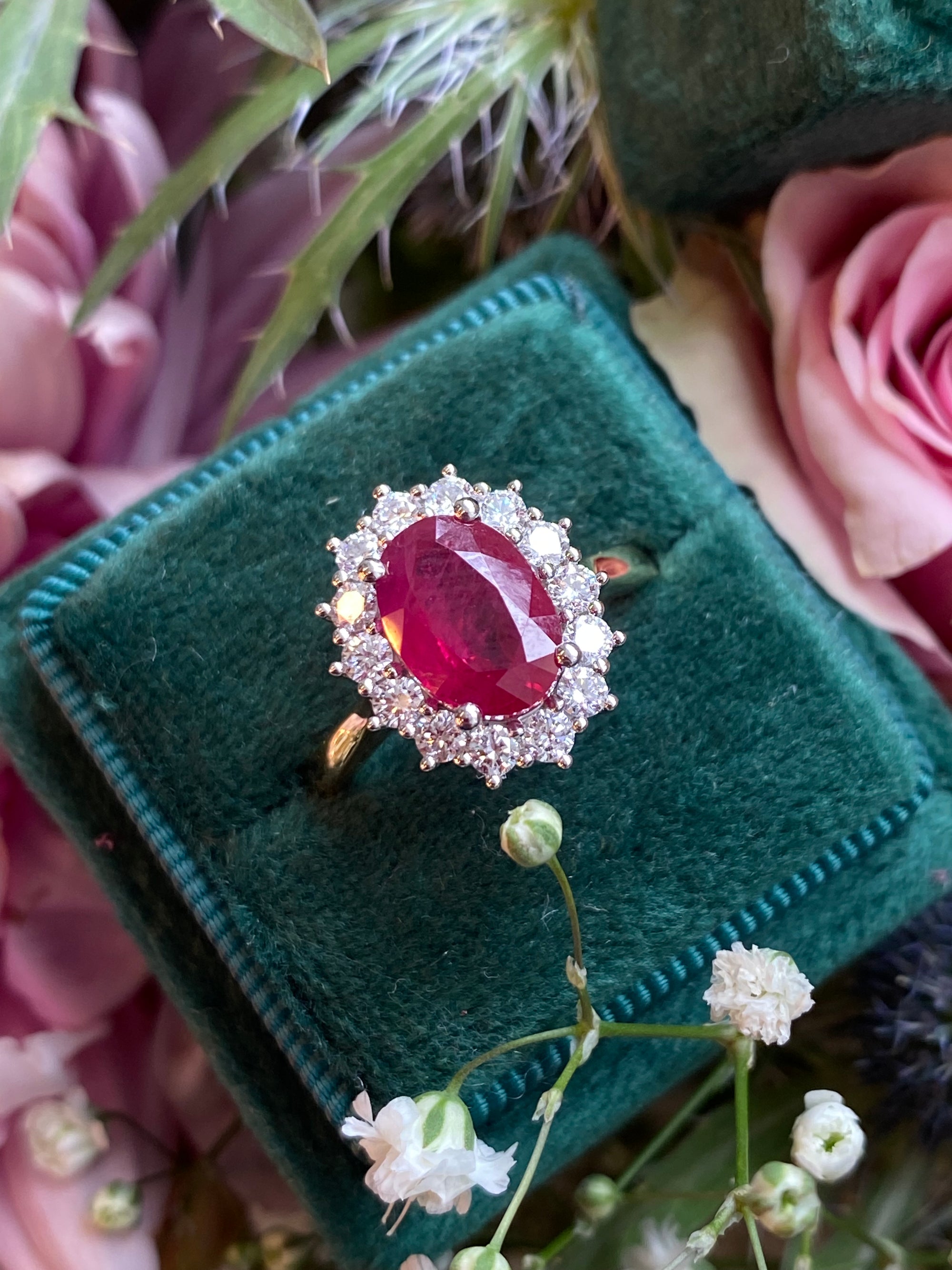 2.95ctw Oval-Cut Ruby and Natural Diamond Halo Ring in Platinum and 18ct Yellow Gold