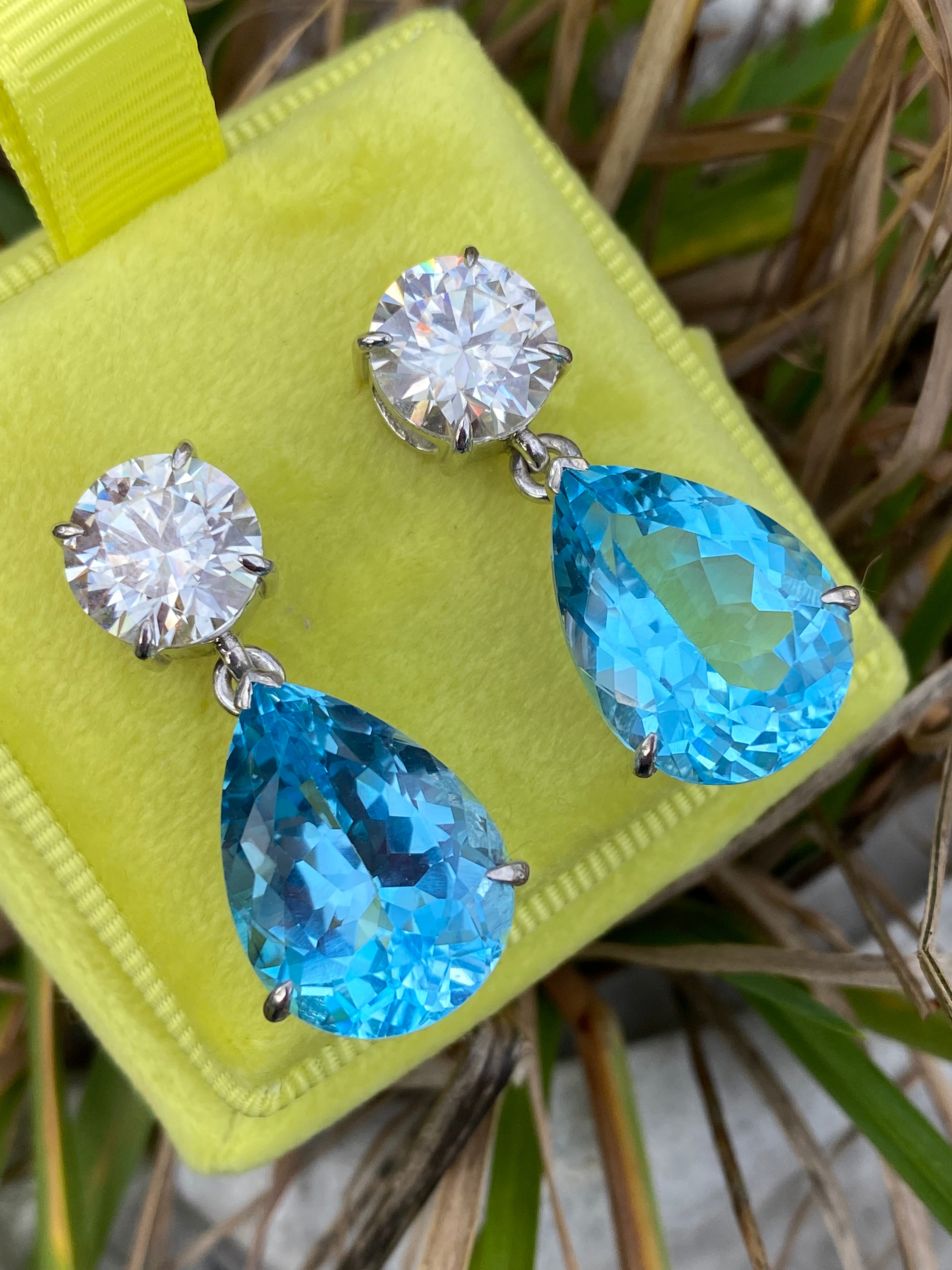 28.00 Carat Pear Cut Blue Topaz and 6.00 CTW Moissanite Earrings in Sterling Silver