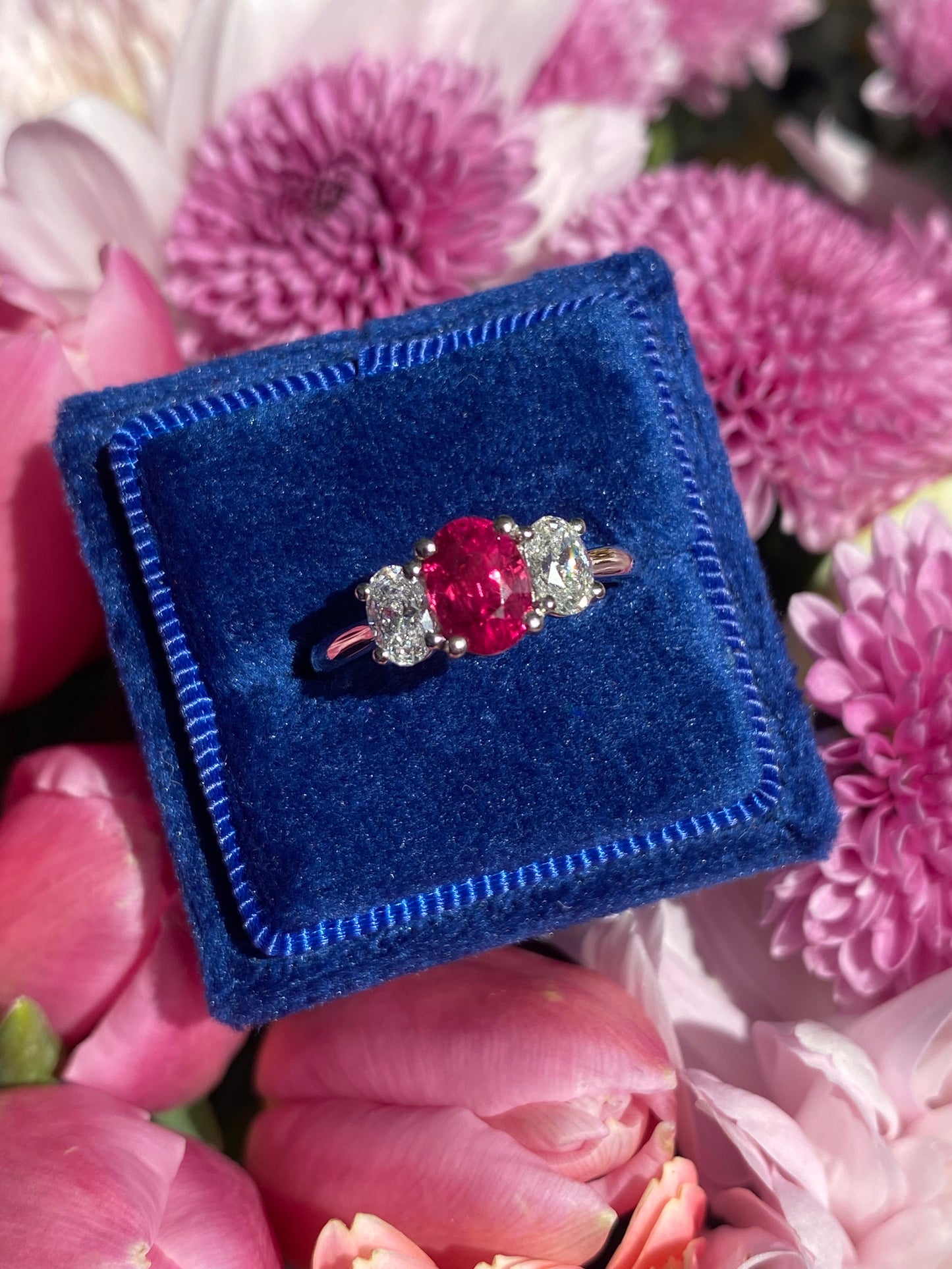 1.34 Carat Ruby and 0.66 Natural Diamond Three Stone Ring in Platinum